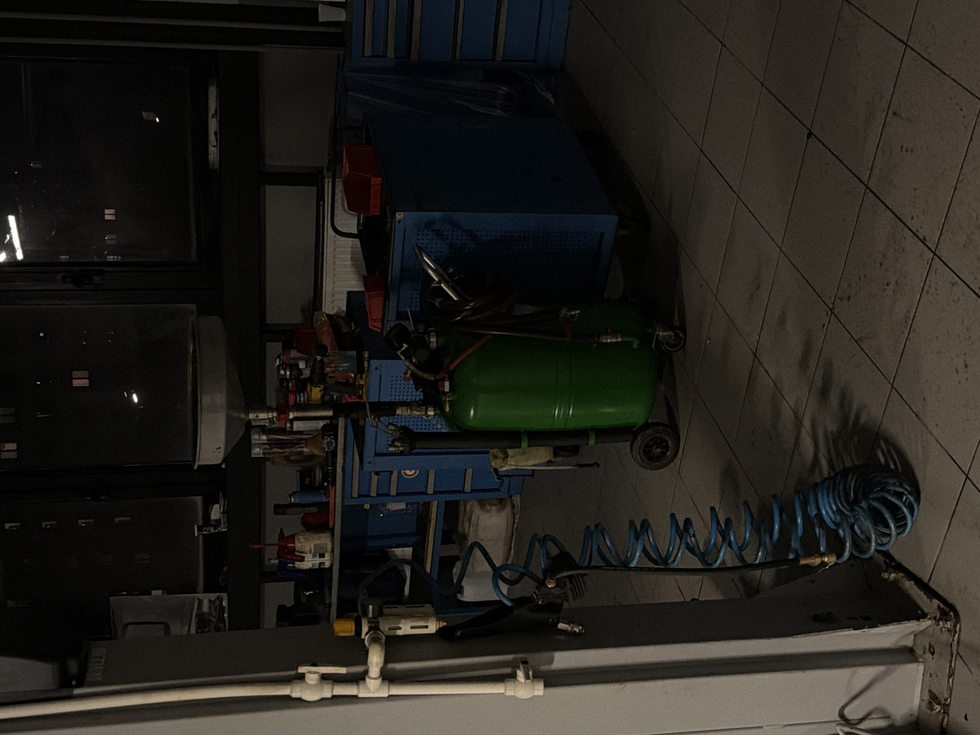 Garage workshop with tools and motorcycle documented in Izhevsk