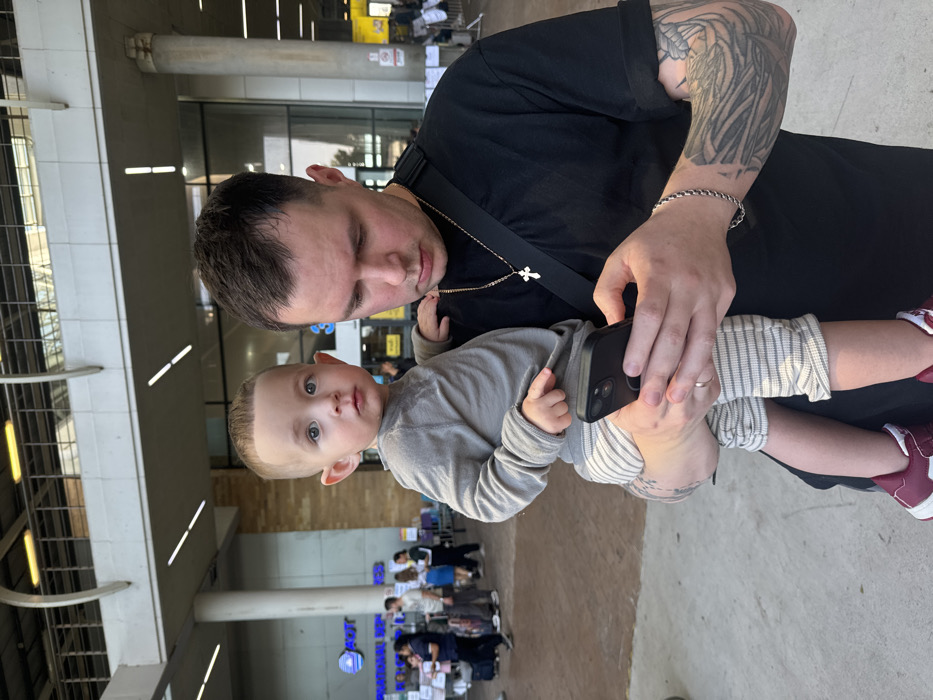 Family travels through Phuket airport with young child