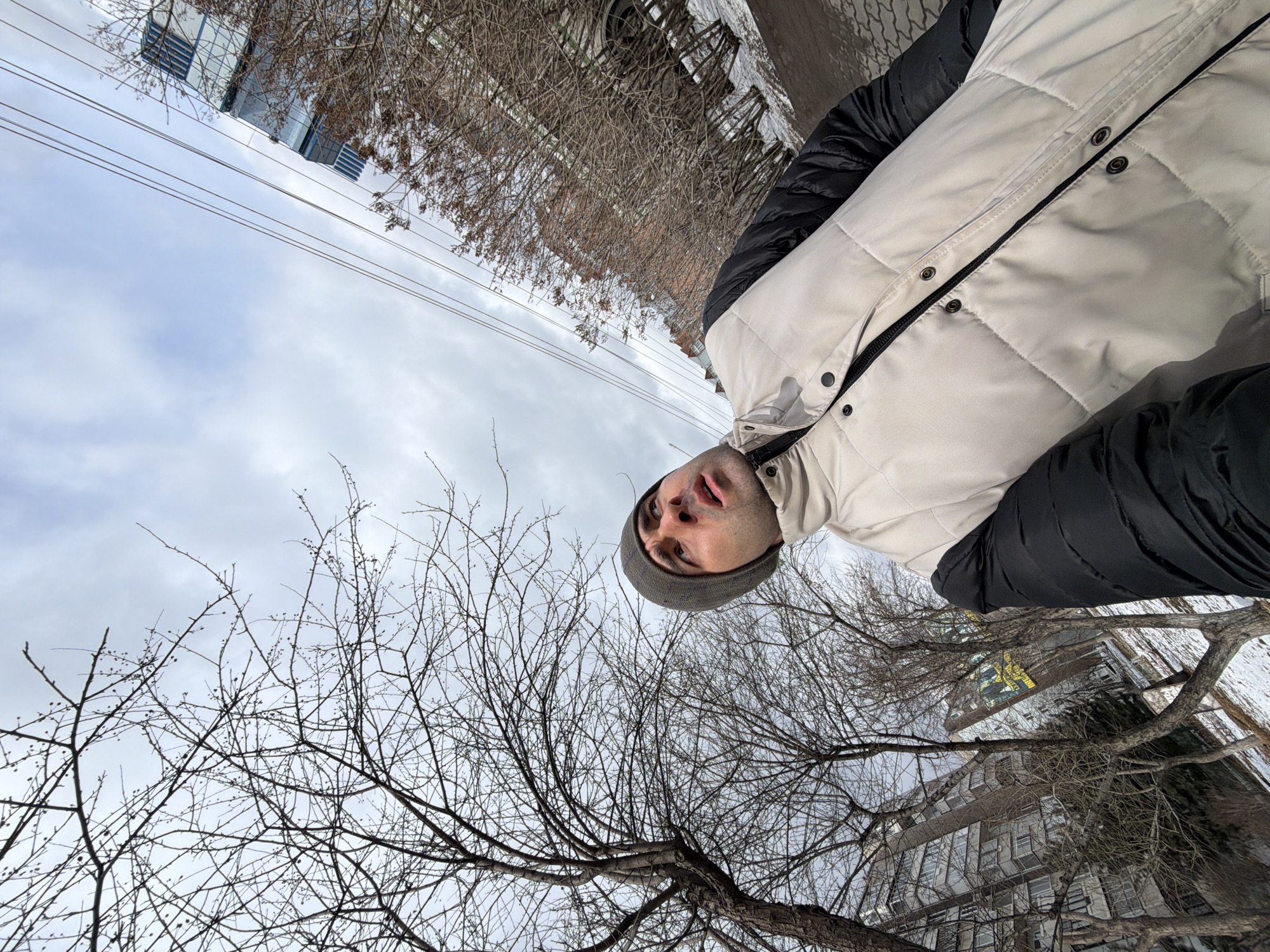 Street crews clear snow from Krasnoyarsk sidewalks