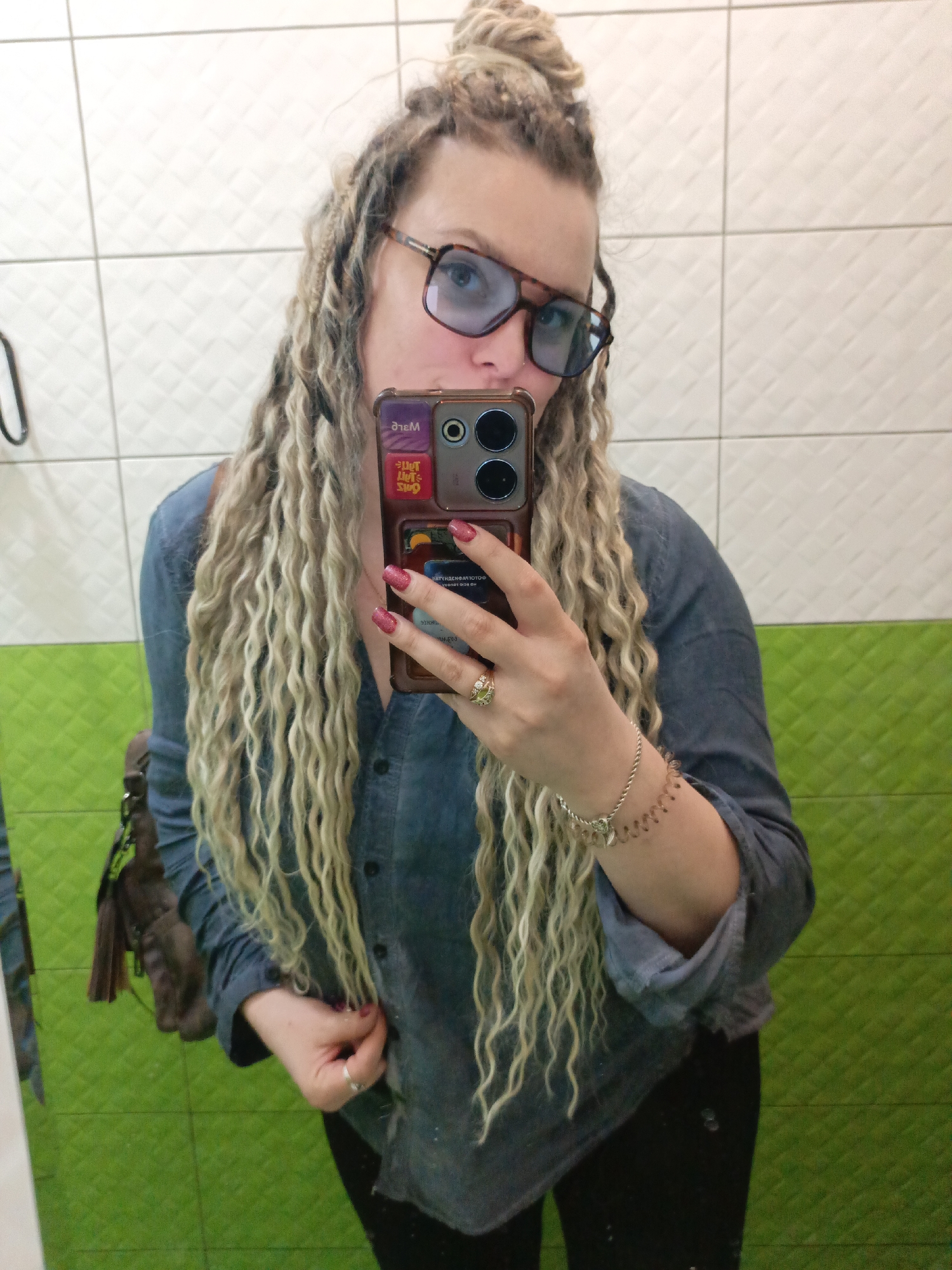 Woman takes bathroom selfies in decorated Russian home