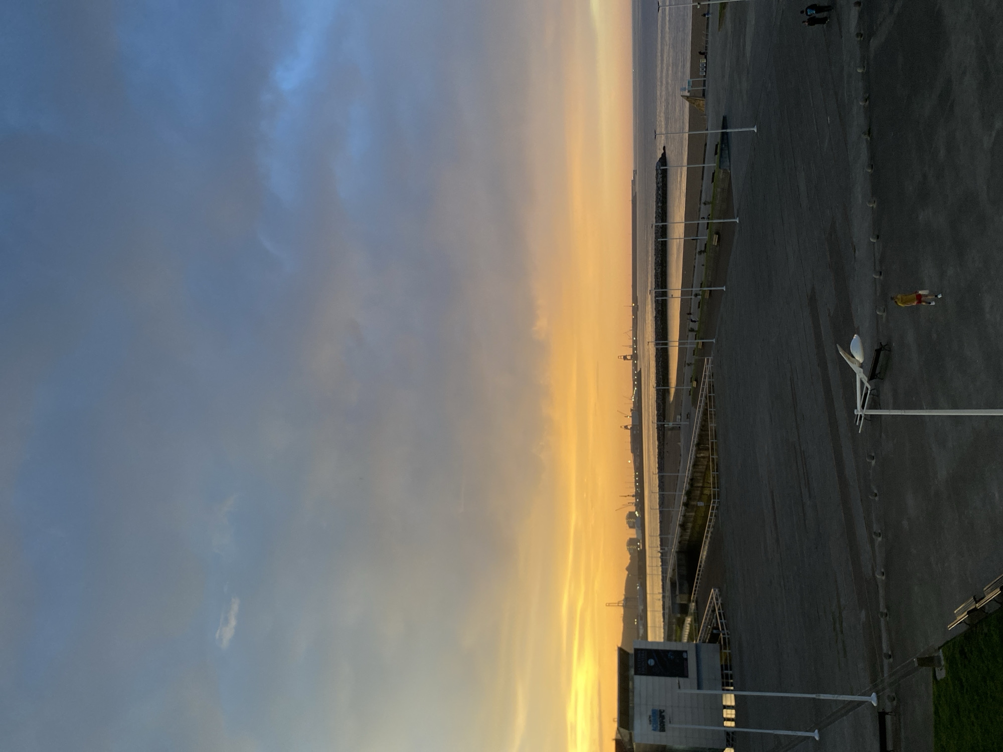 Evening moments captured in Gijón: coastal dusk, kitchen cooking