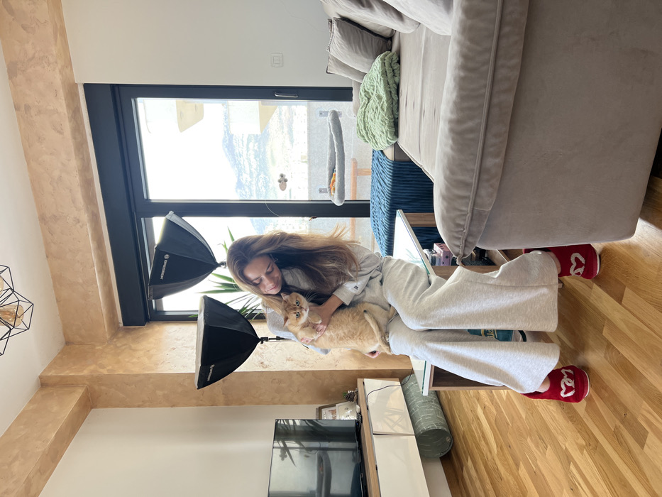Woman and cat observed in Bar apartment morning scene