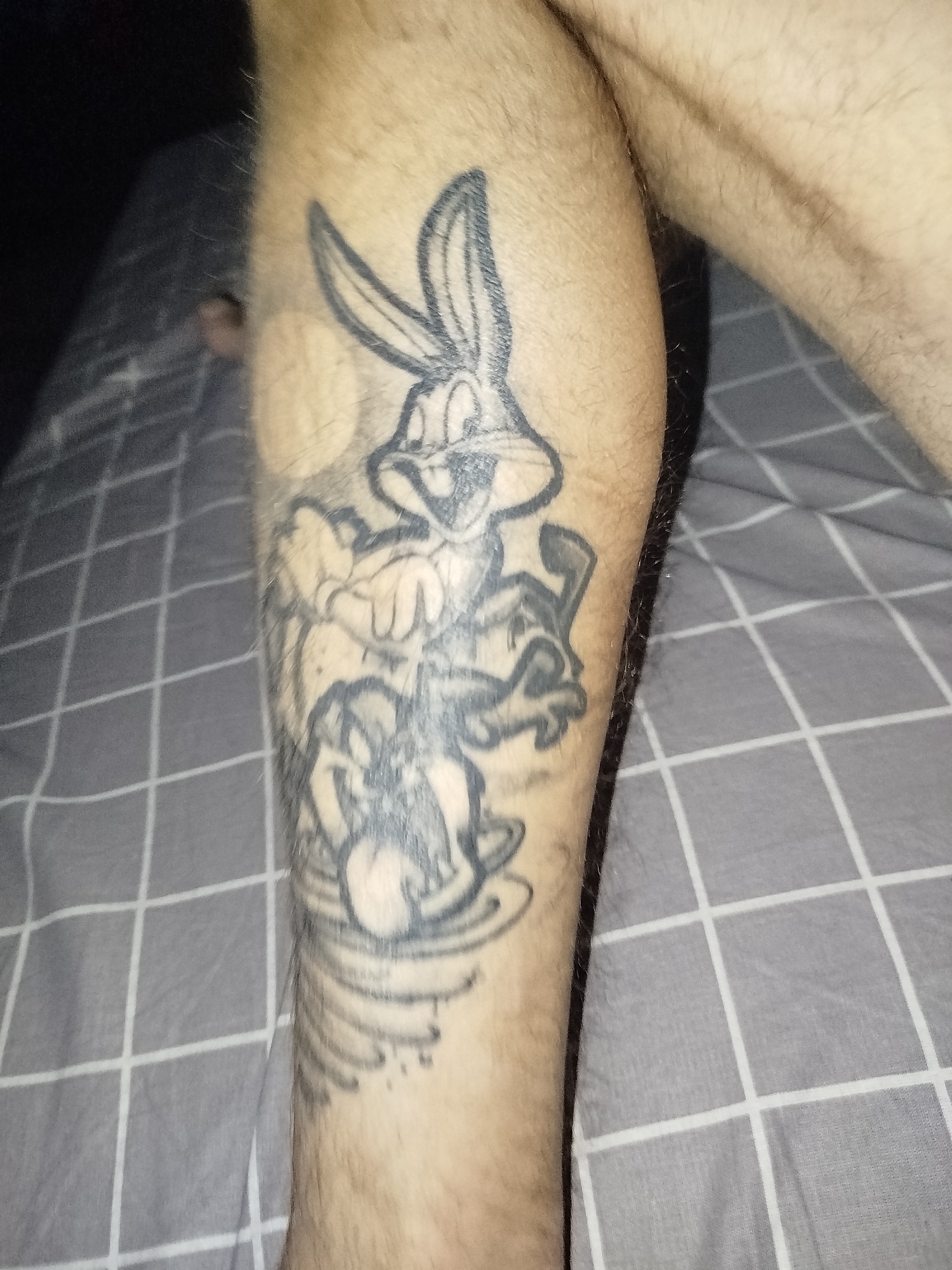 Person displays cartoon character tattoos in Russian town