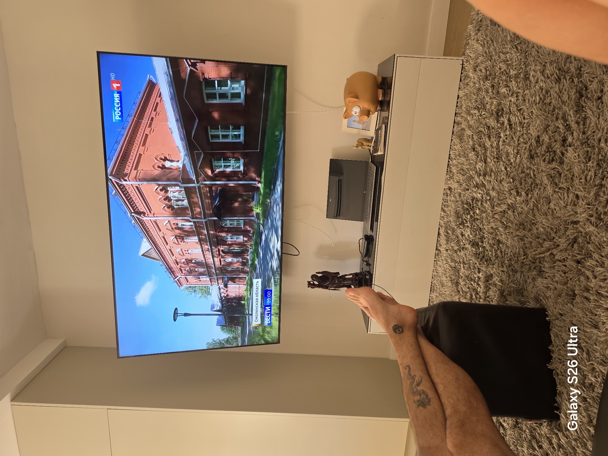 Lazy Sunday morning in a Palma apartment, Russian news on TV