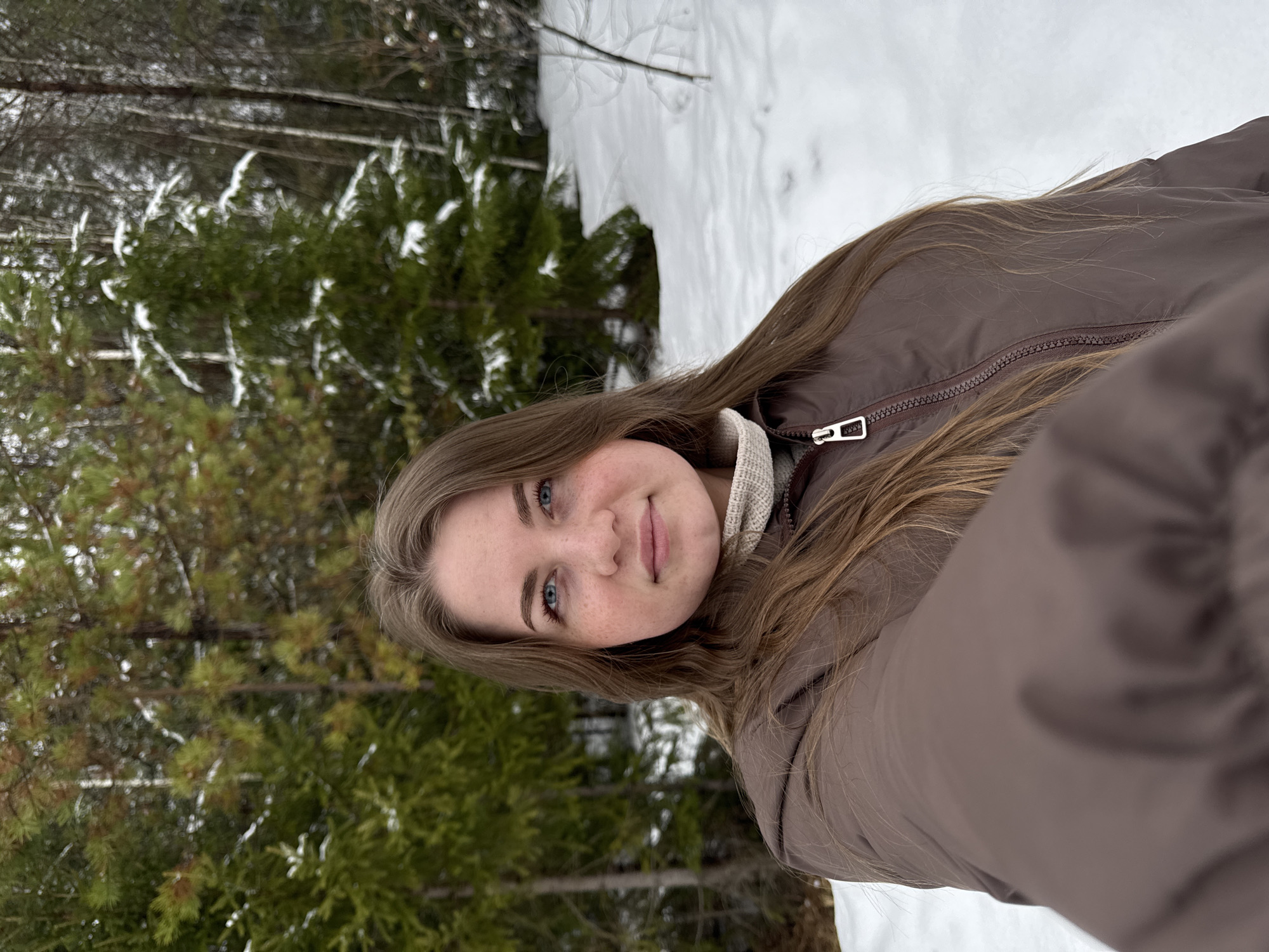 Woman takes winter selfies in snowy Russian village