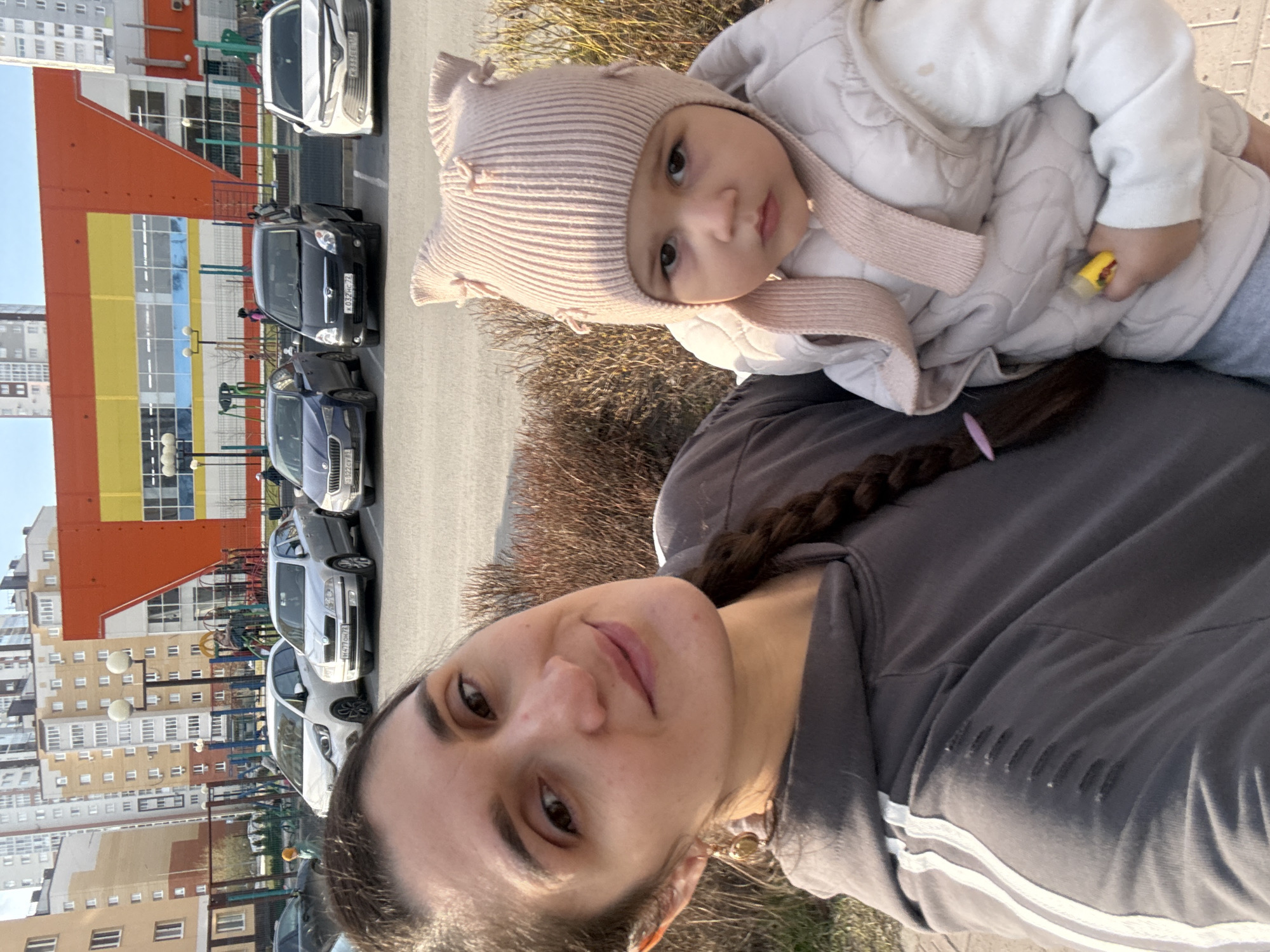 Woman photographed with baby in sunny Tobolsk
