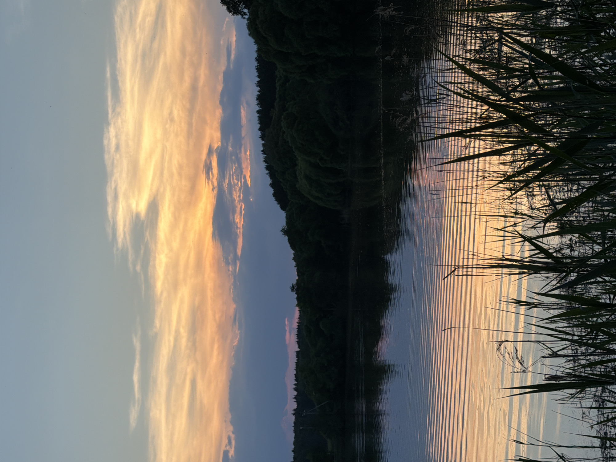Evening documented at Russian village lake and Orthodox church
