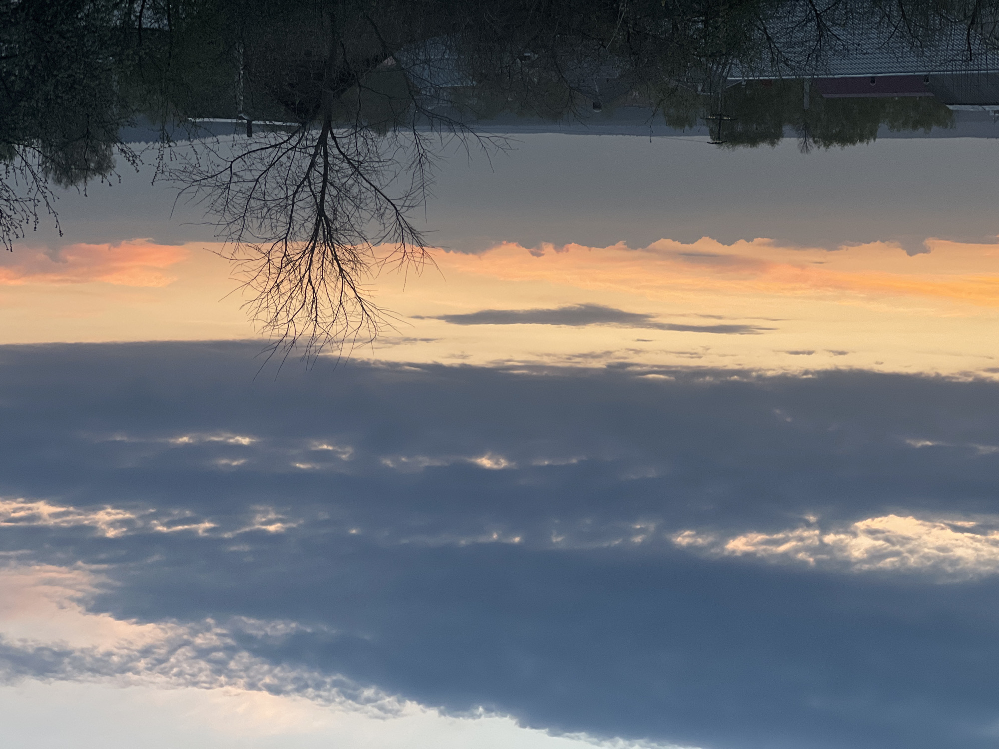 Dramatic sunset captured over Votkinsk, Russia with layered clouds