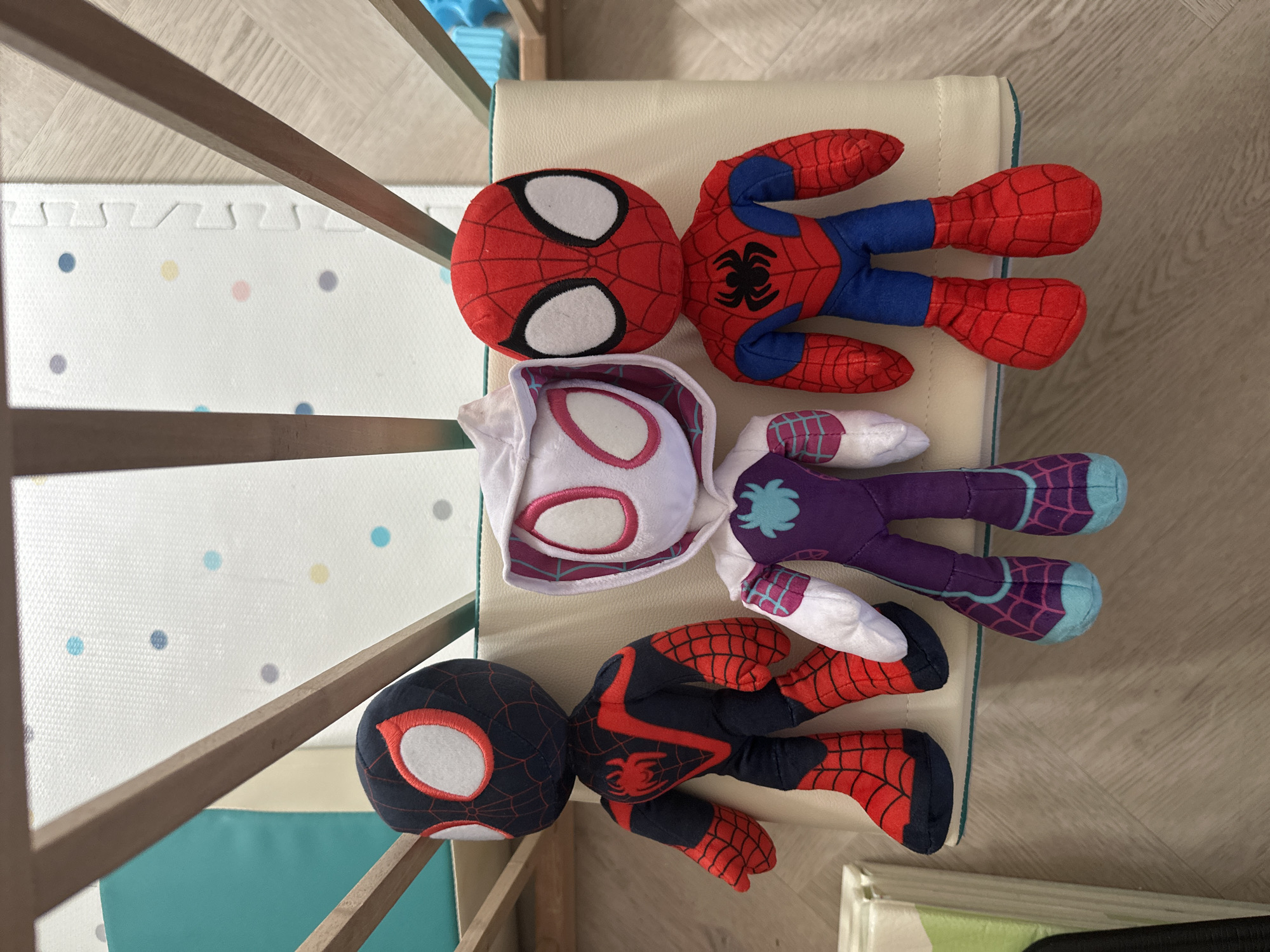 Three Spider-Man plush toys lined up in Leeds