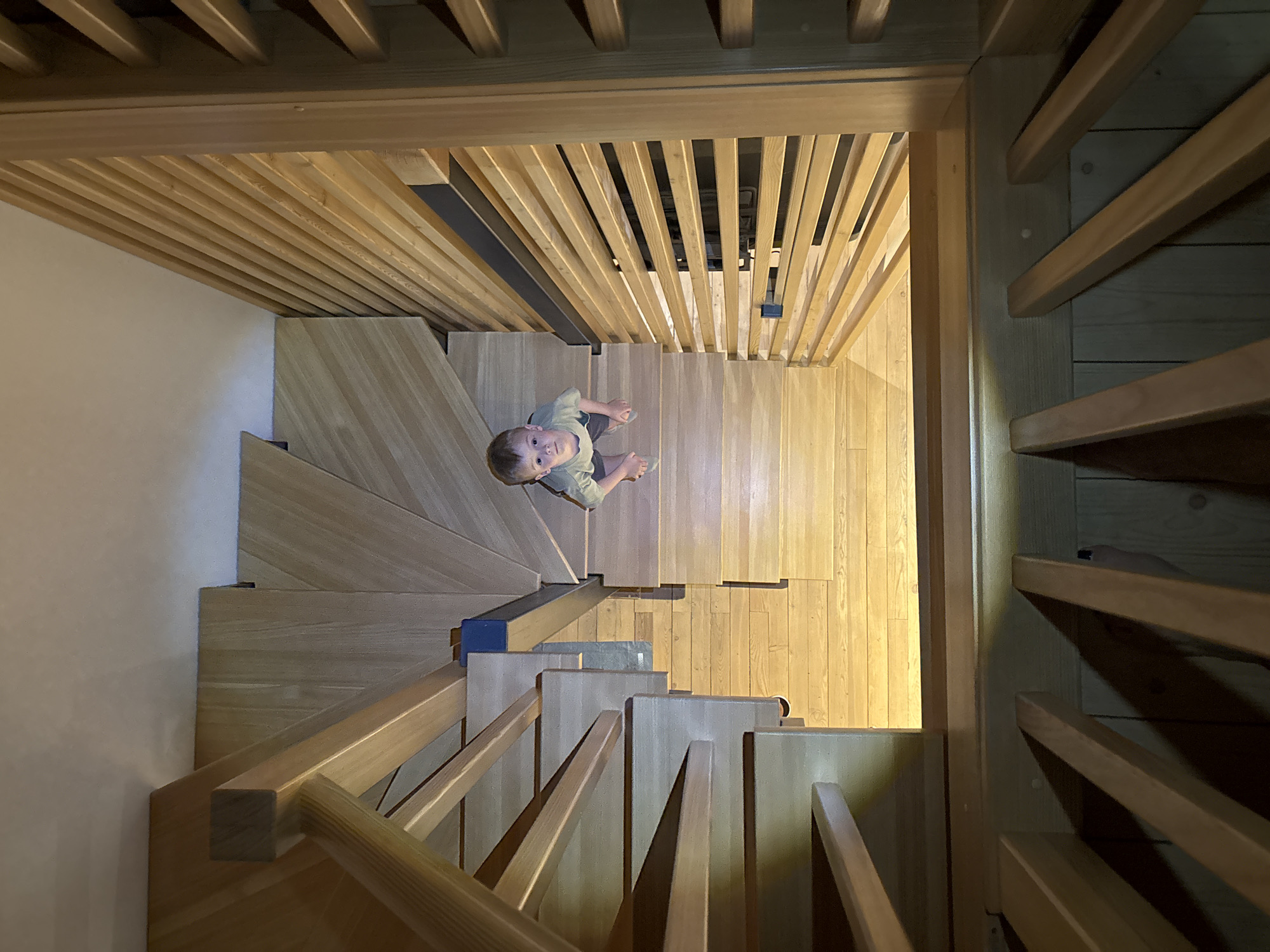 Children captured in quiet indoor moments across Chaikovsky, Russia