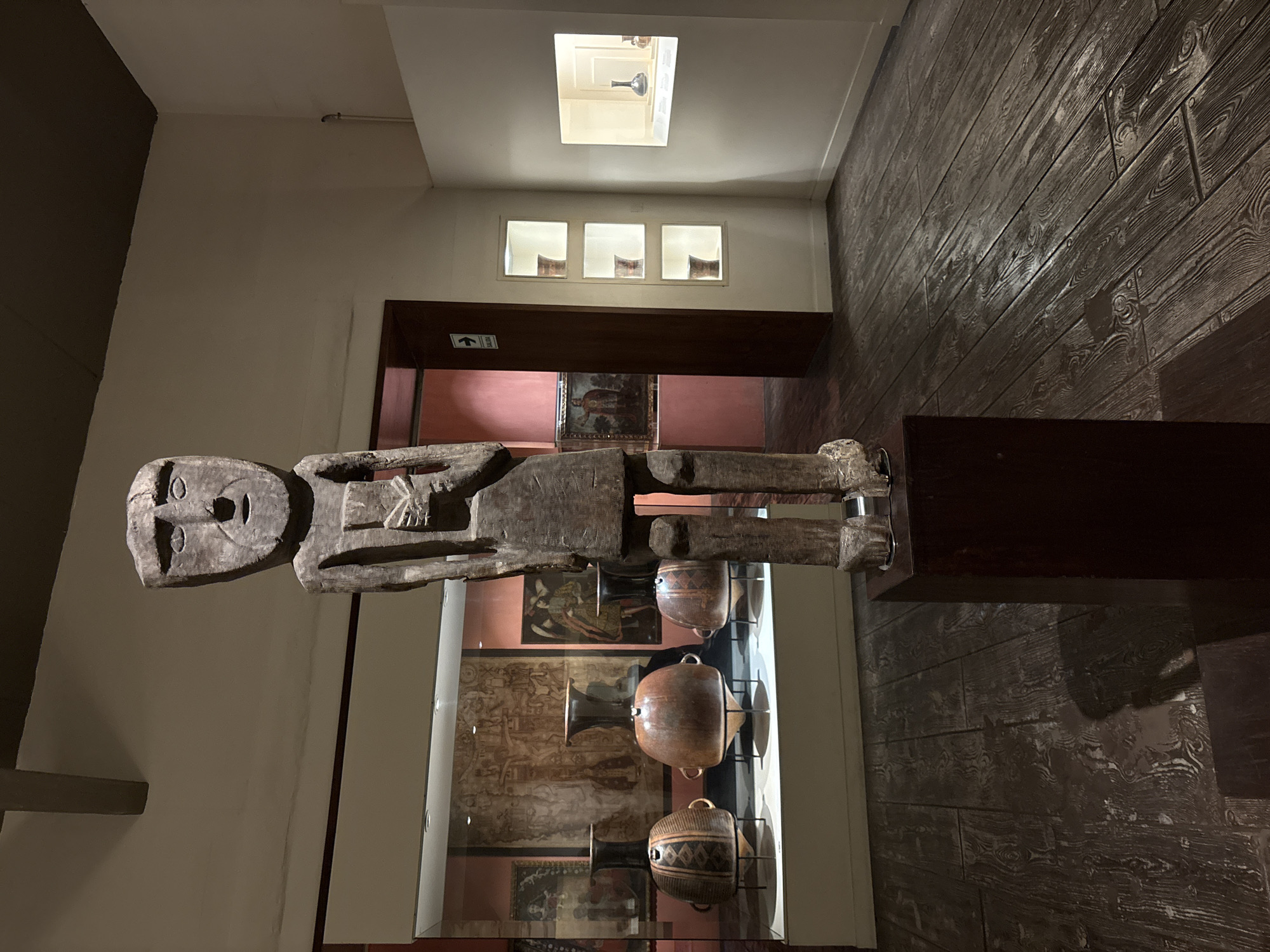 Museum visitor documents ancient Peruvian artifacts in Pueblo Libre