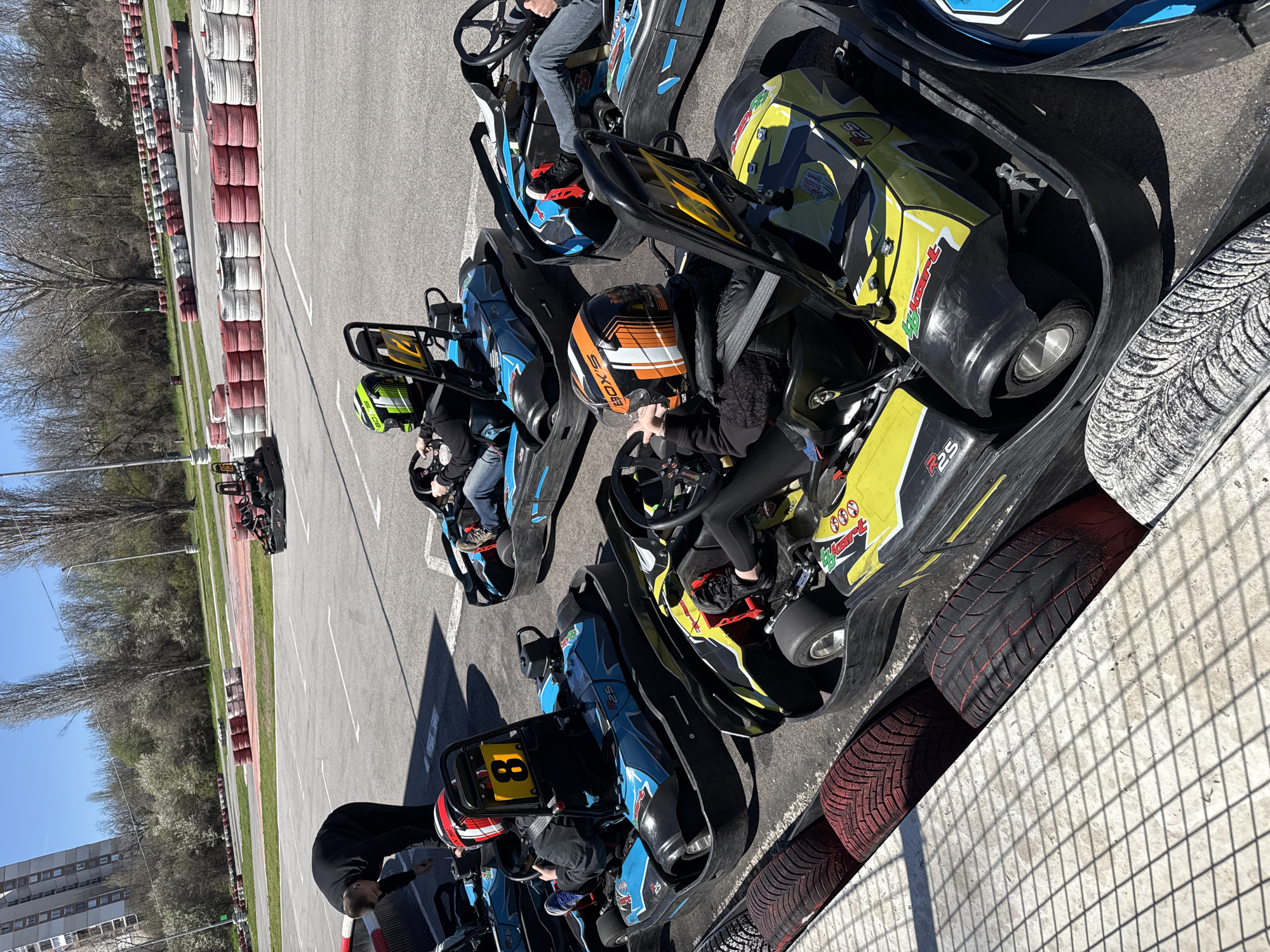 Go-kart drivers line up on Sofia track