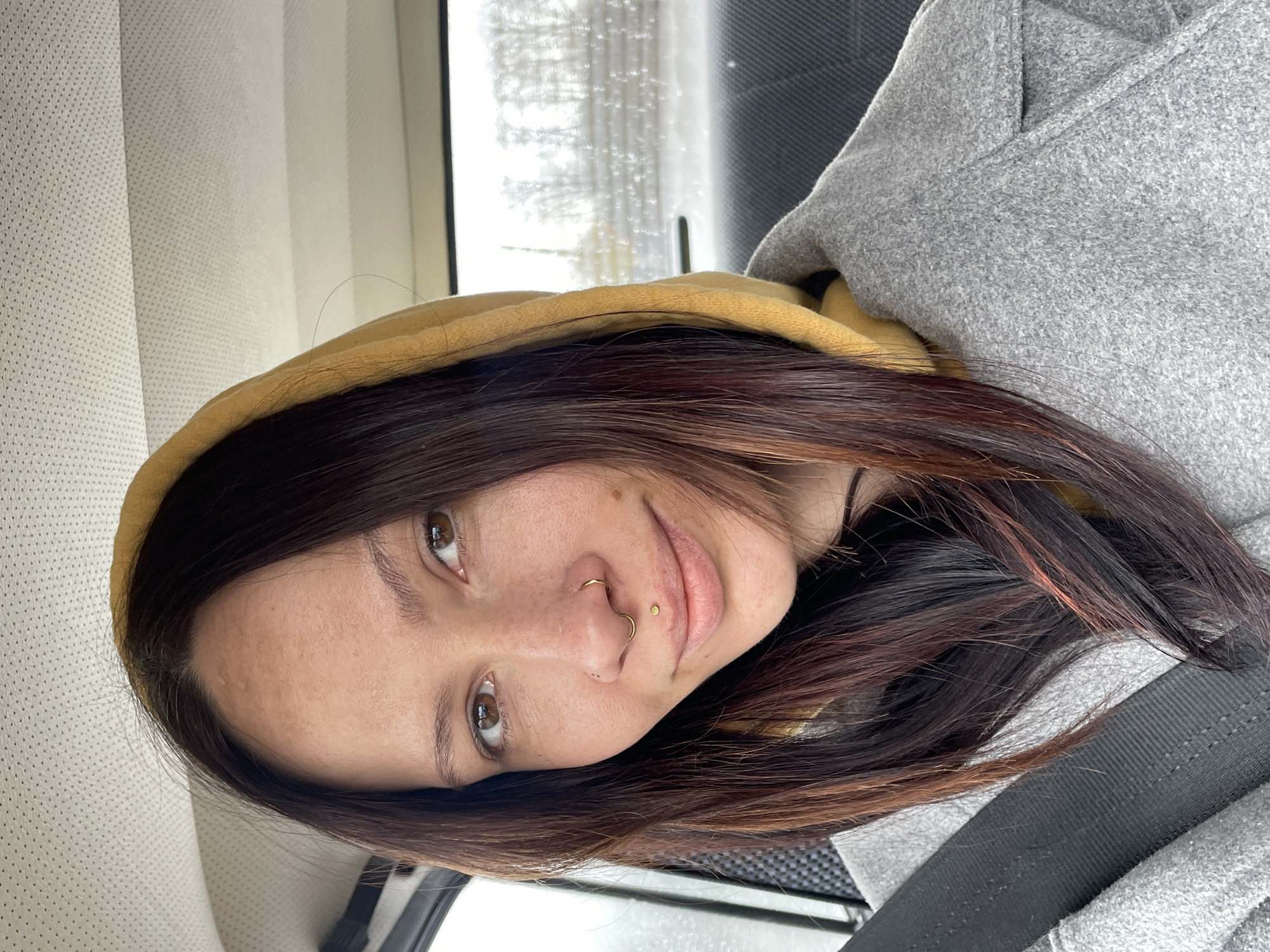 Woman takes selfie in vehicle in Kabanikha, Russia