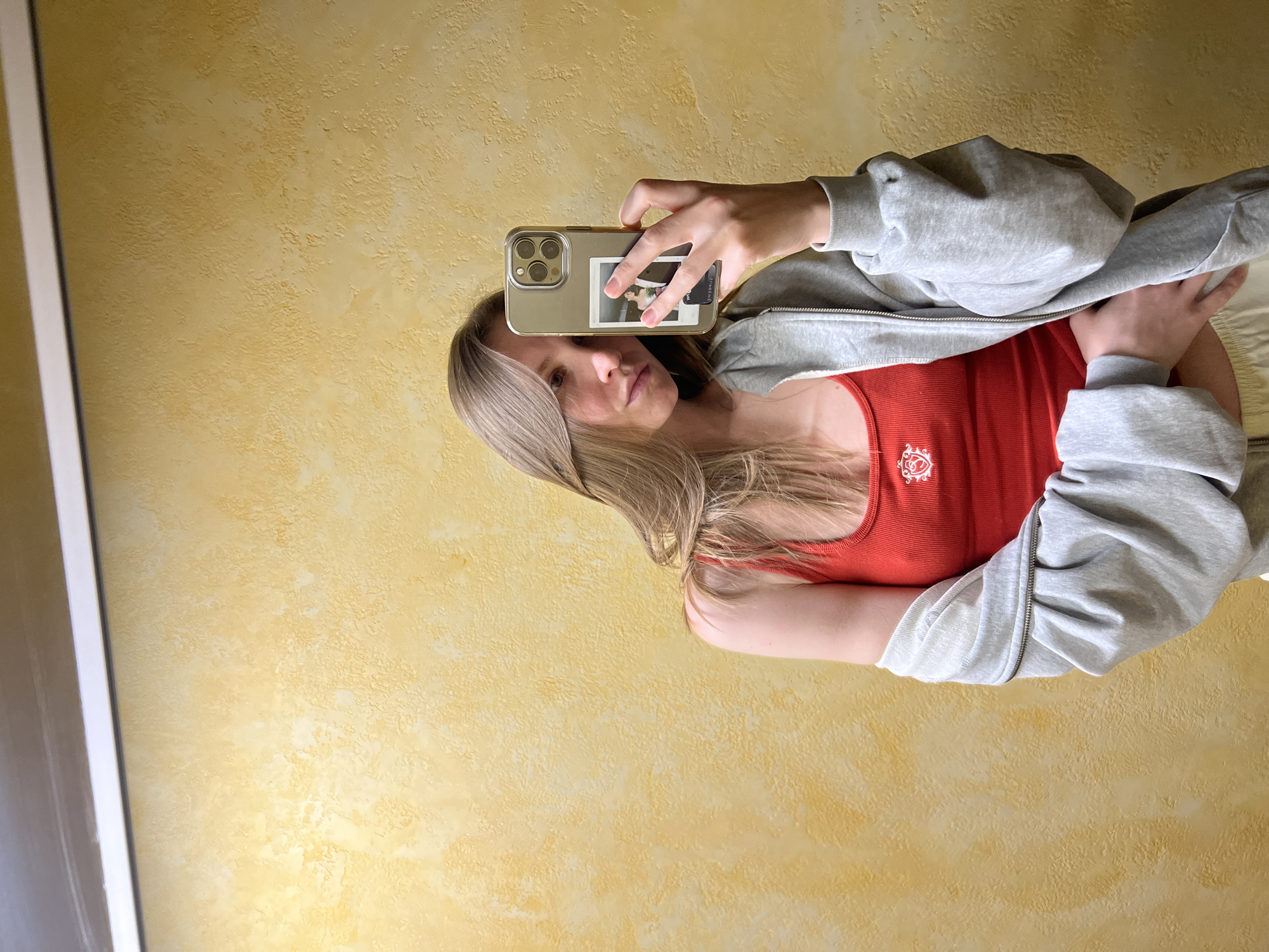 Woman takes selfies with dog in Khimki apartment