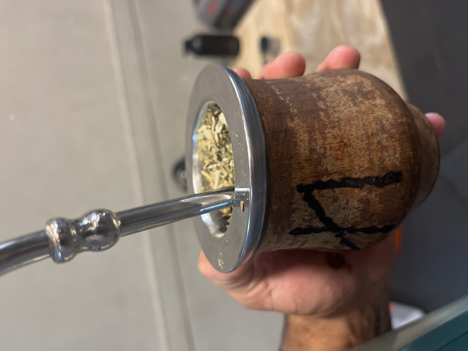 Gym workout session documented with mate breaks in Argentina