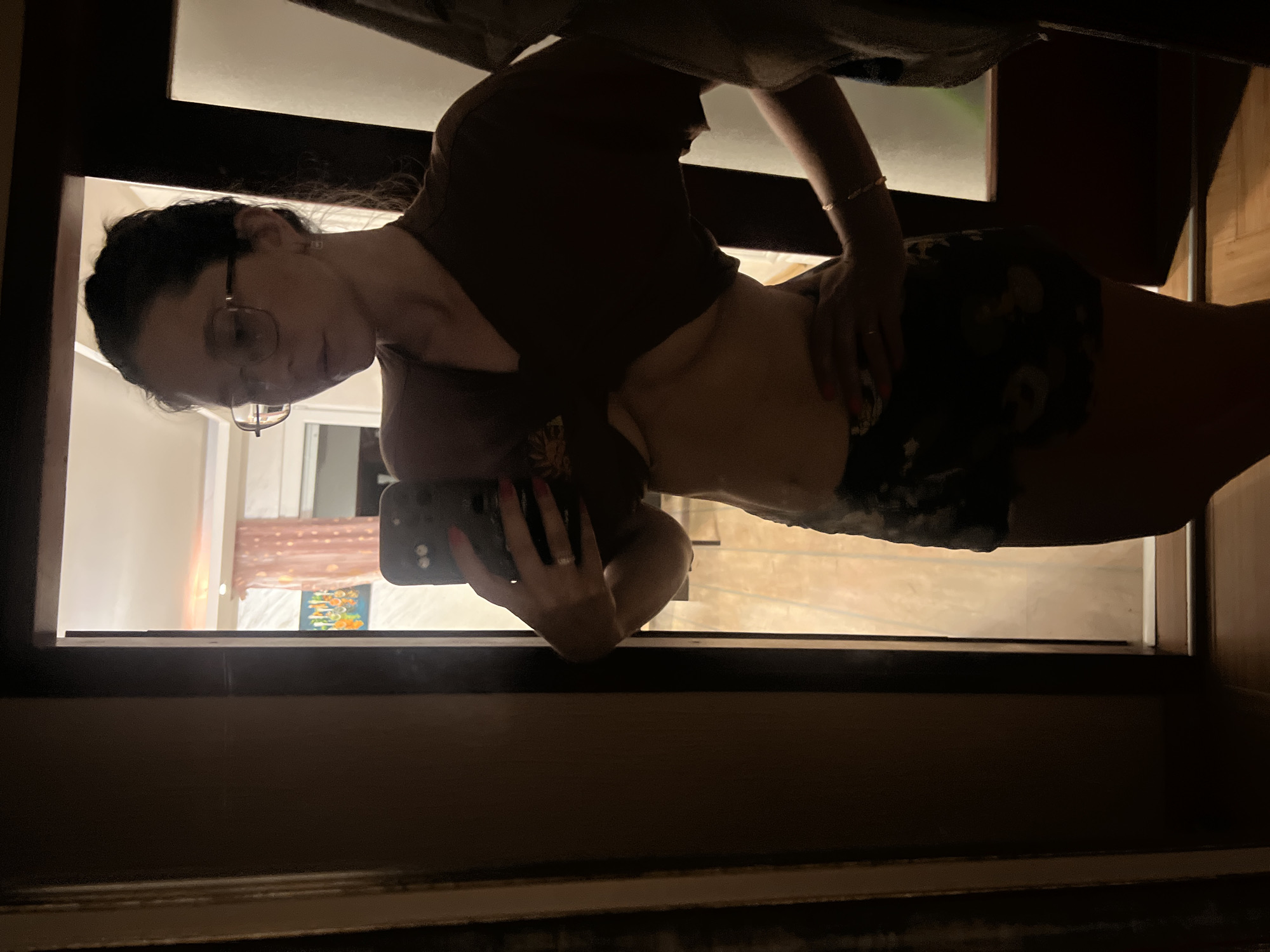 Woman takes mirror selfies in Podgorica apartment