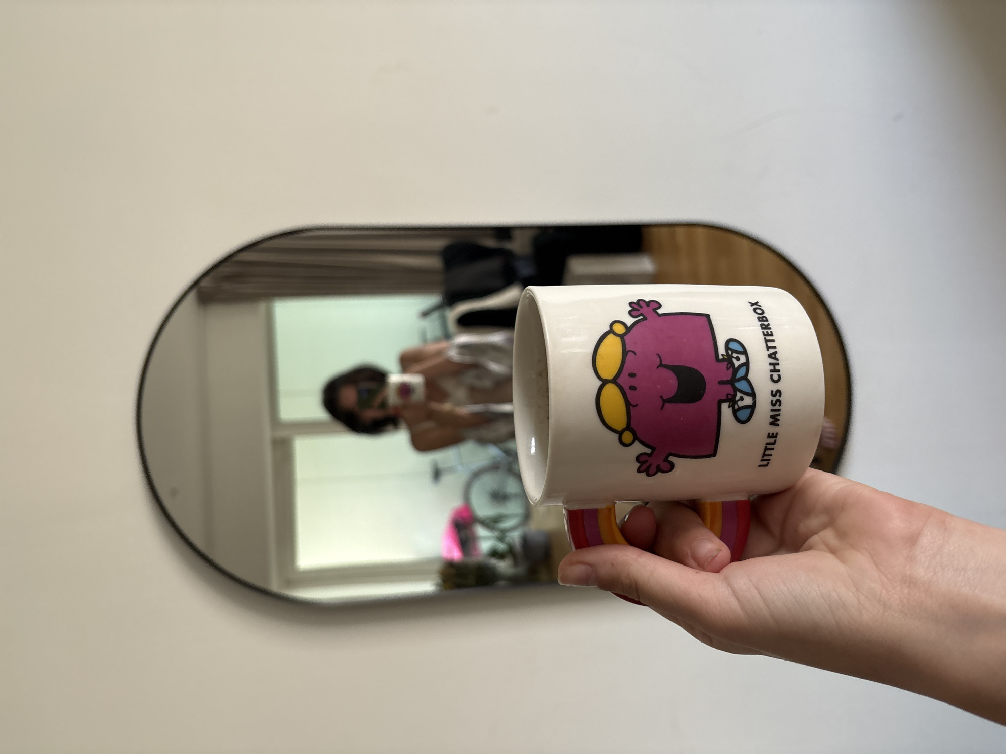 Lazy London morning: bedroom, a character mug, and a hashtag