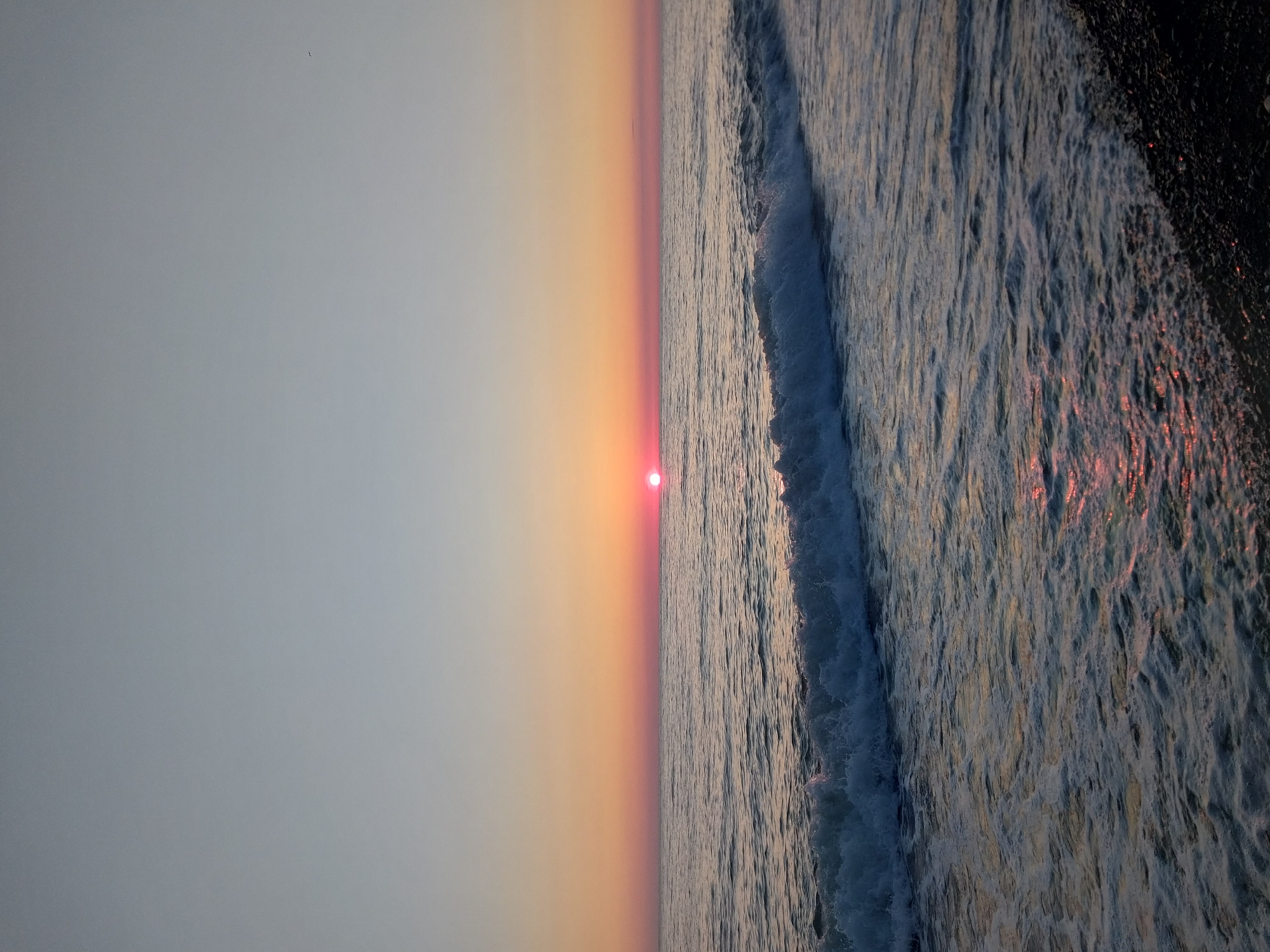 Coastal sunrise captured in multiple photos along Sochi waterfront