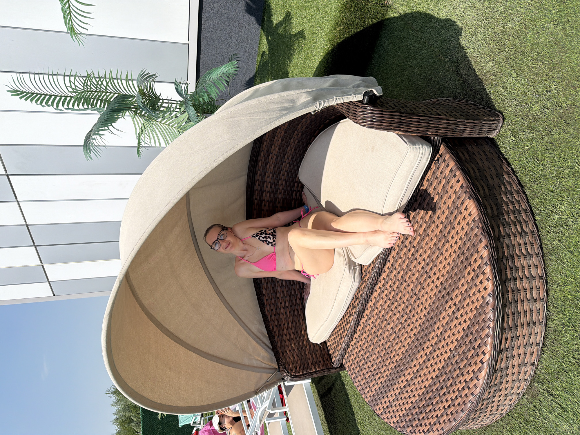 Woman relaxes in bikini on Moscow lounge chairs
