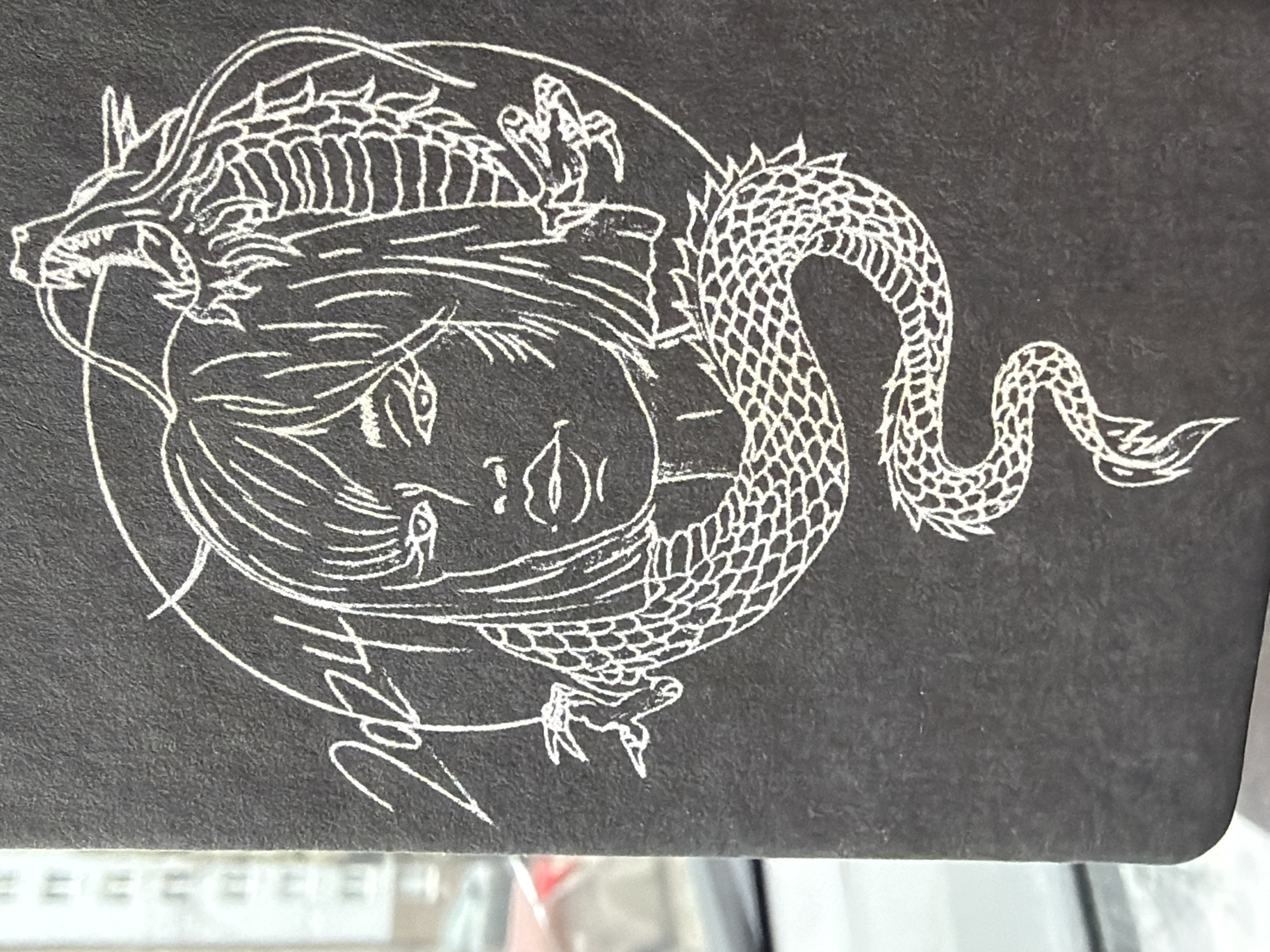 Dragon artwork and muddy truck documented in Izhevsk