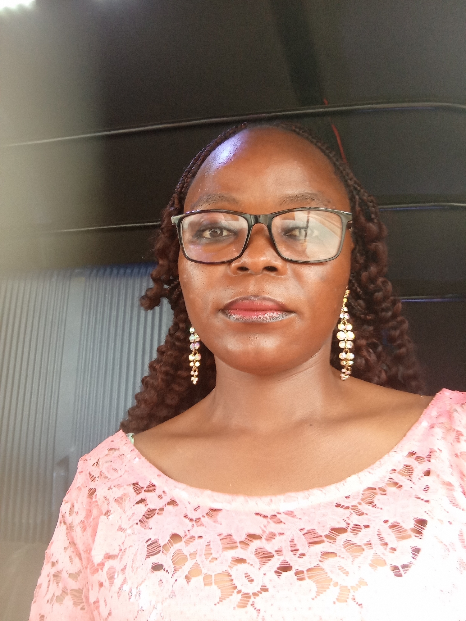 Portrait series inside a vehicle, Howayi, Nigeria