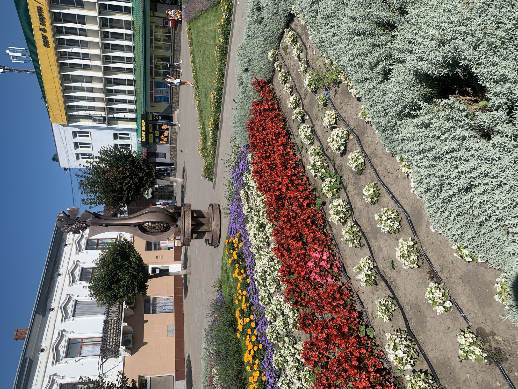 Kolomyia's central square on a bright summer afternoon