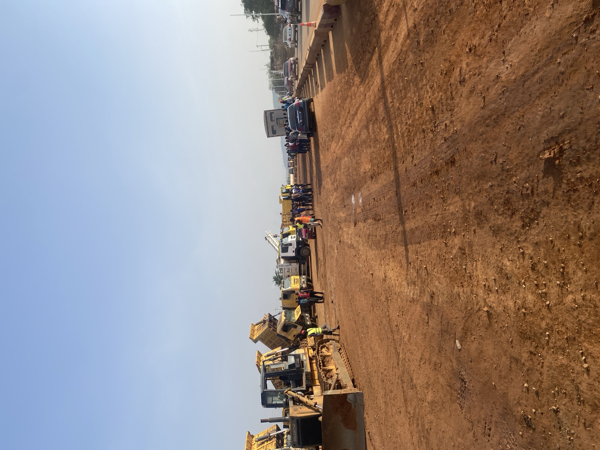 Road construction underway in Abuja with heavy machinery