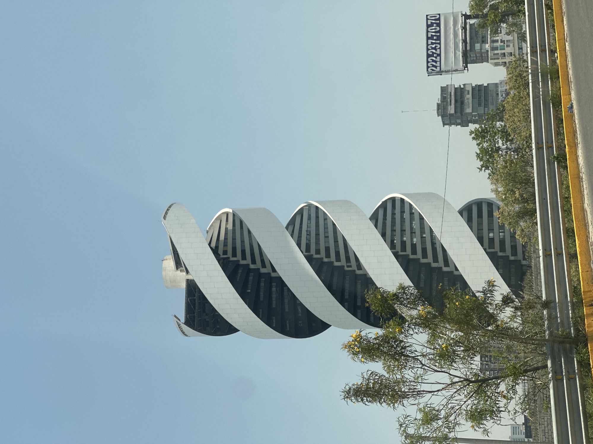Modern spiral building captured in San Bernardino Tlaxcalancingo