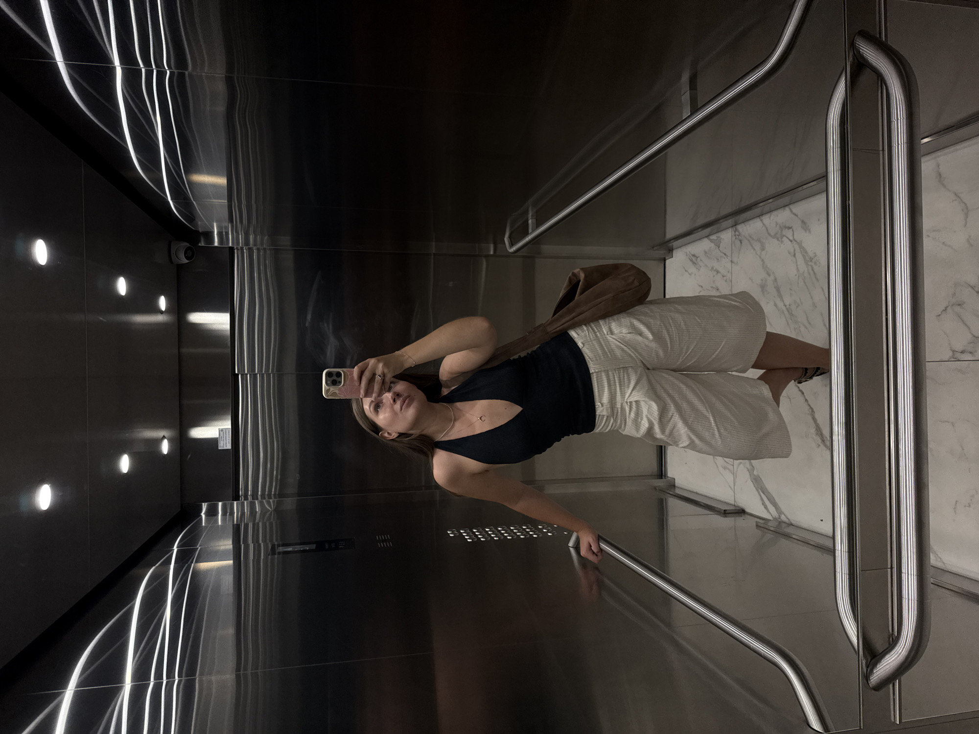 Elevator mirror selfie, Belgrade — halter top and pinstripe culottes