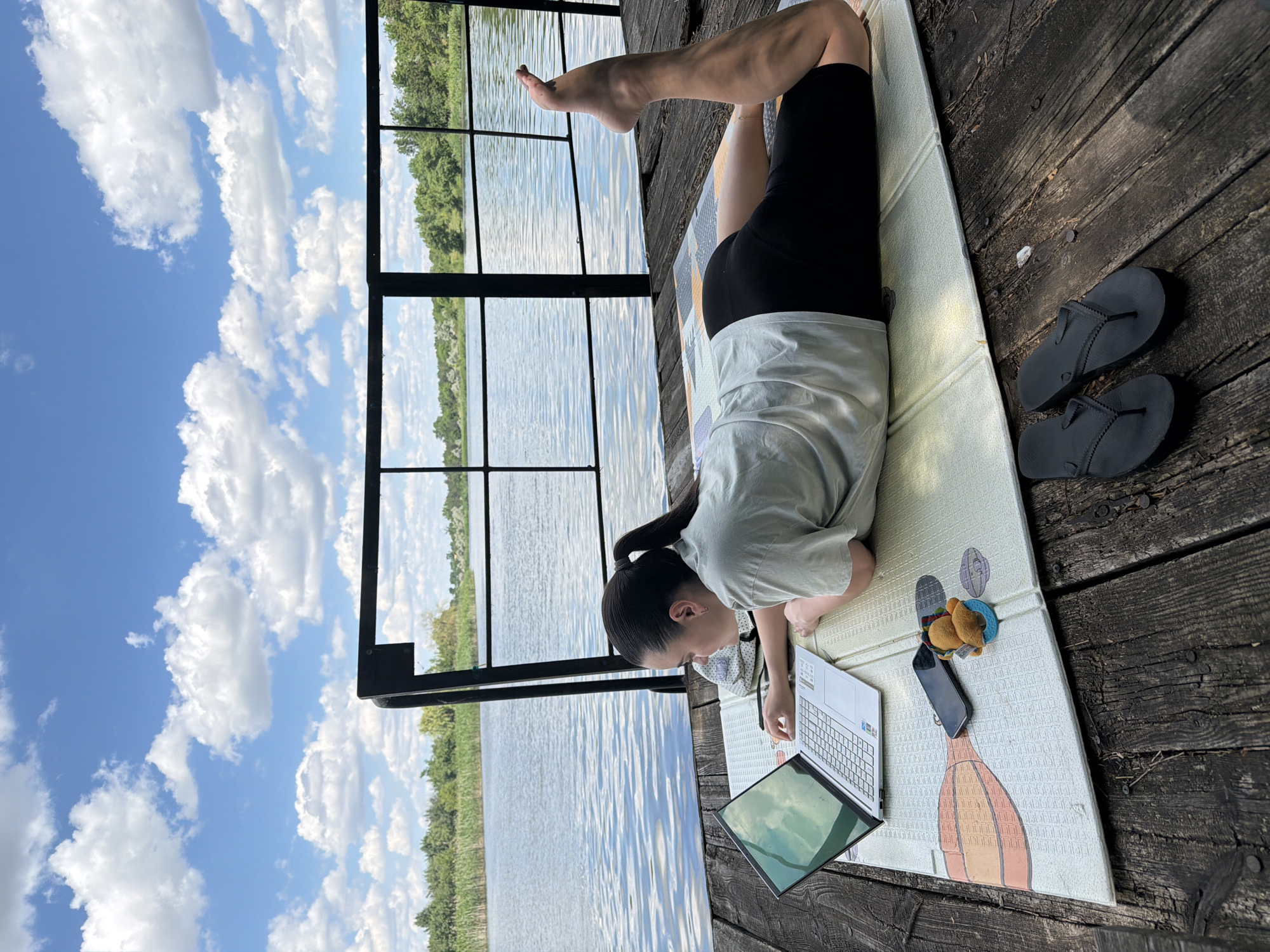 Lazy riverside morning on a wooden pier in Lozuvatka