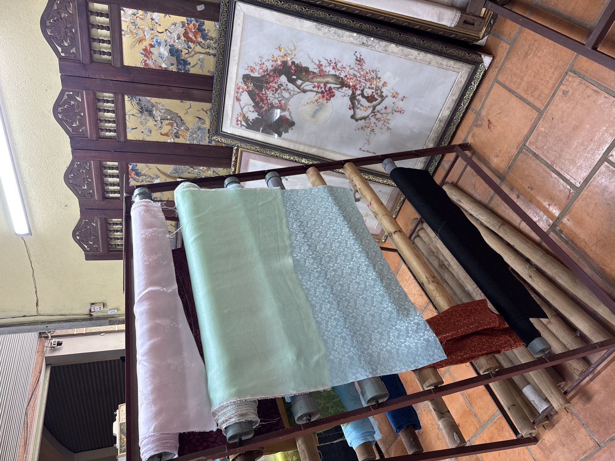 Textile workshop with traditional Vietnamese displays documented in Nam Ban