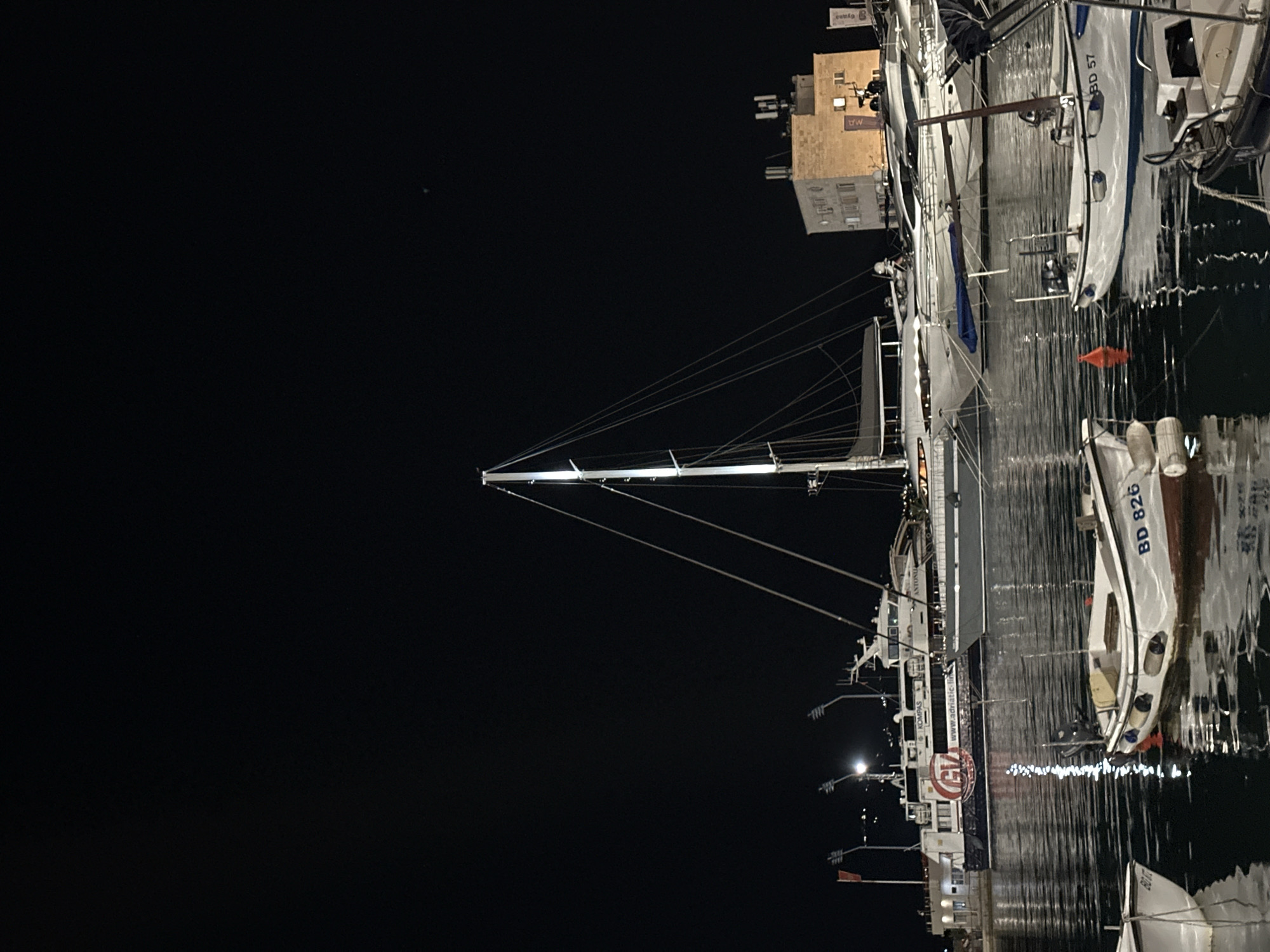 Budva evening: marina lights, old town streets, and band rehearsal