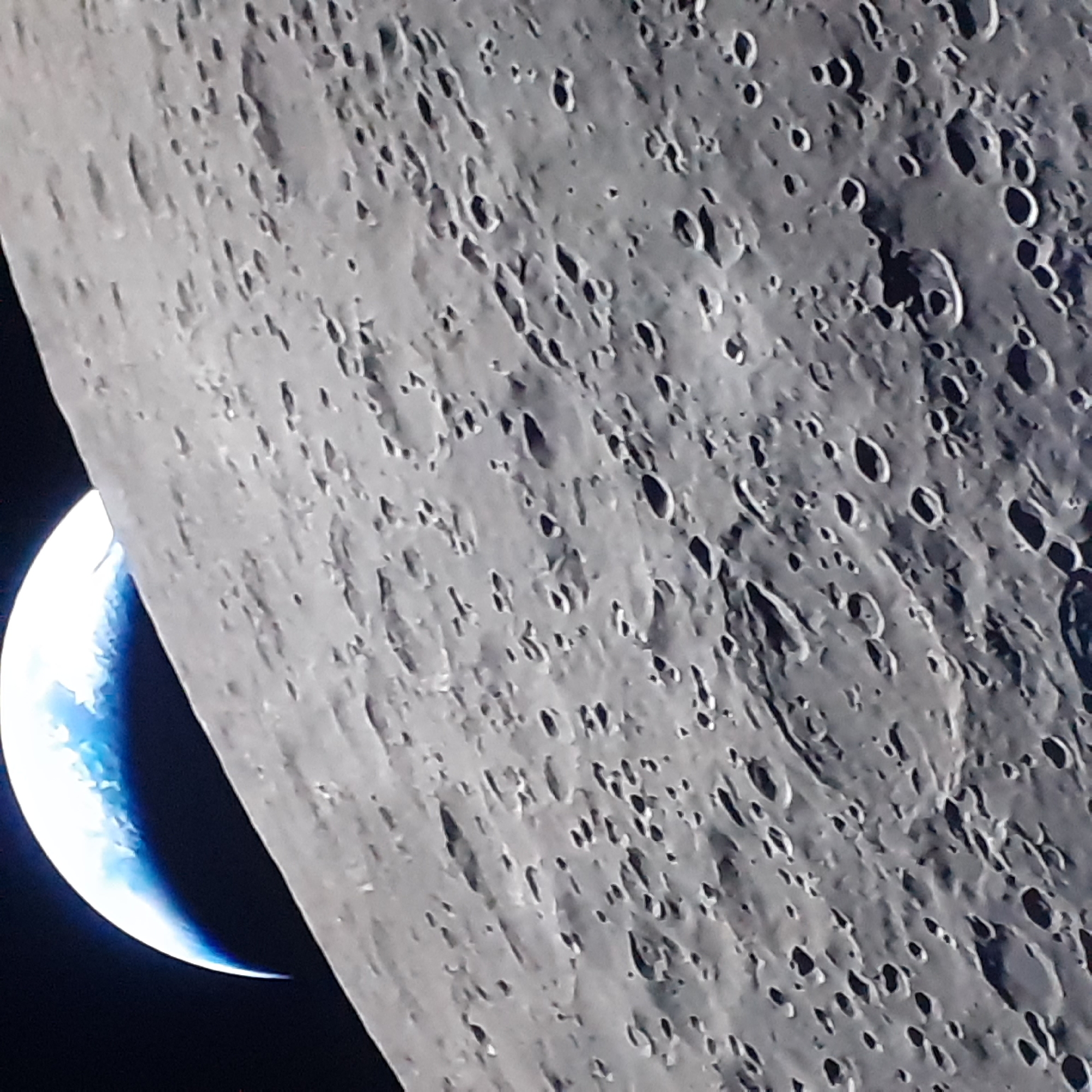 Sofia observer photographs moon surface with crescent Earth visible