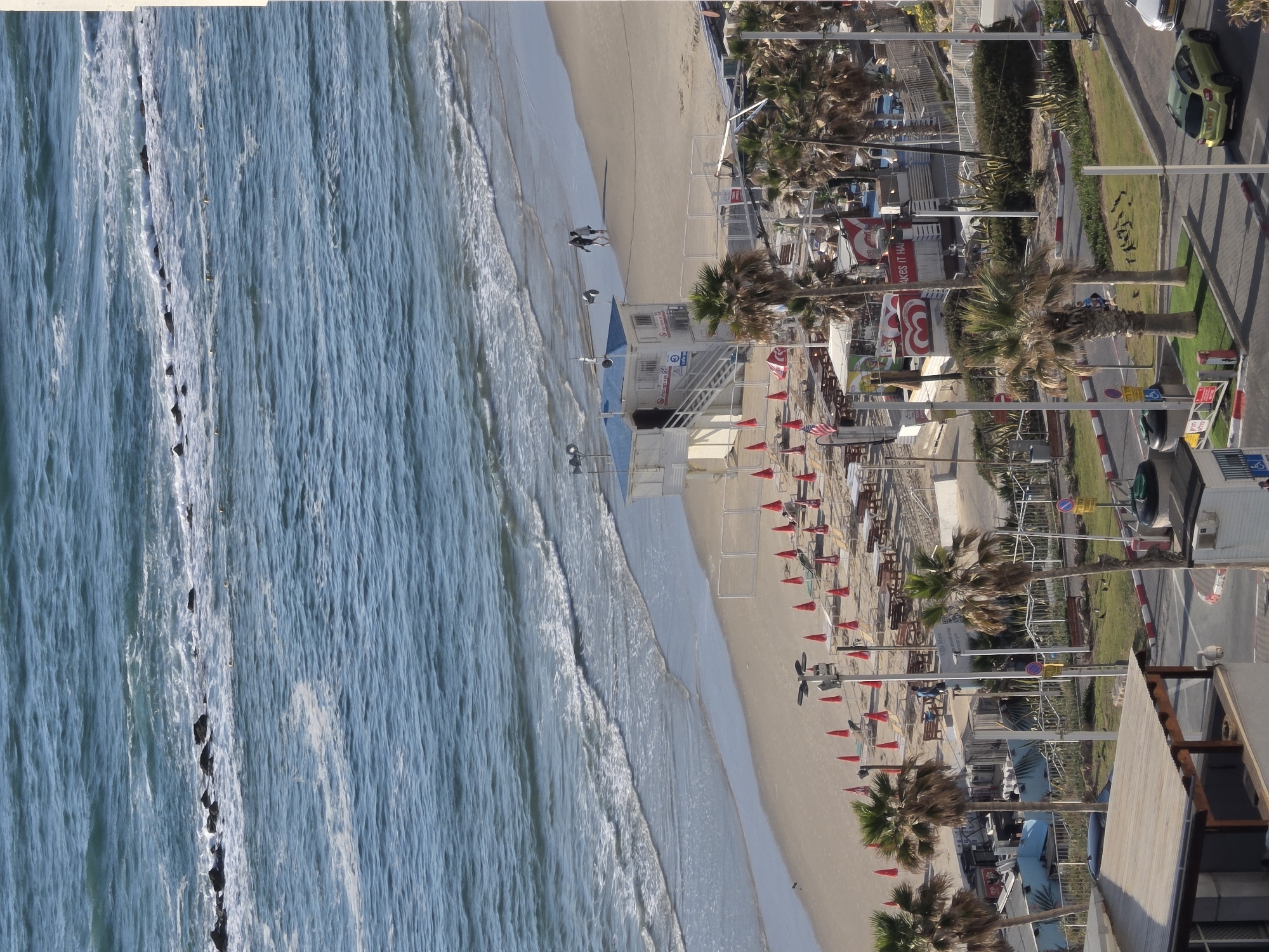 Aerial views document Bat Yam beach and construction activity