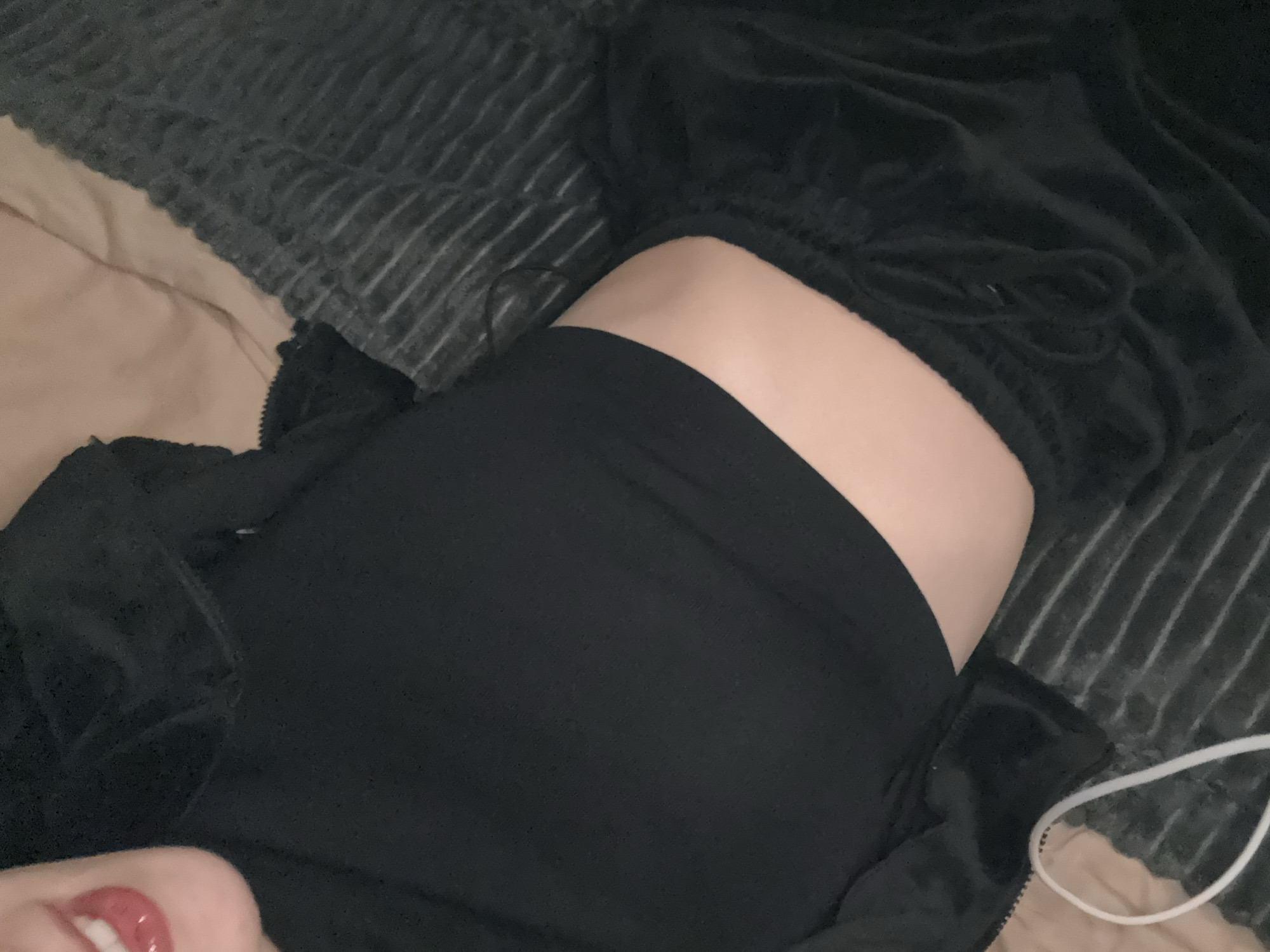 Person takes multiple selfies in black sportswear in Sofia