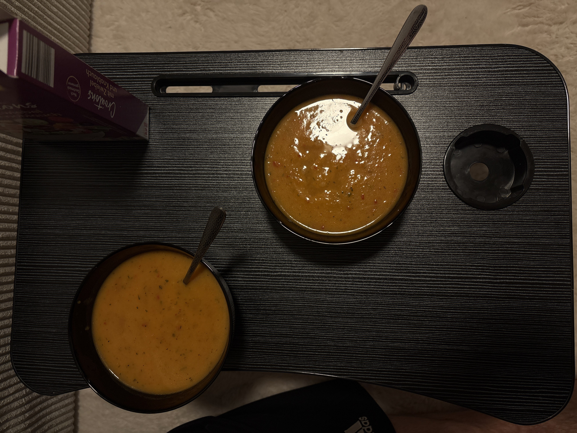 Indoor meal served on wooden tray documented in Mönchengladbach