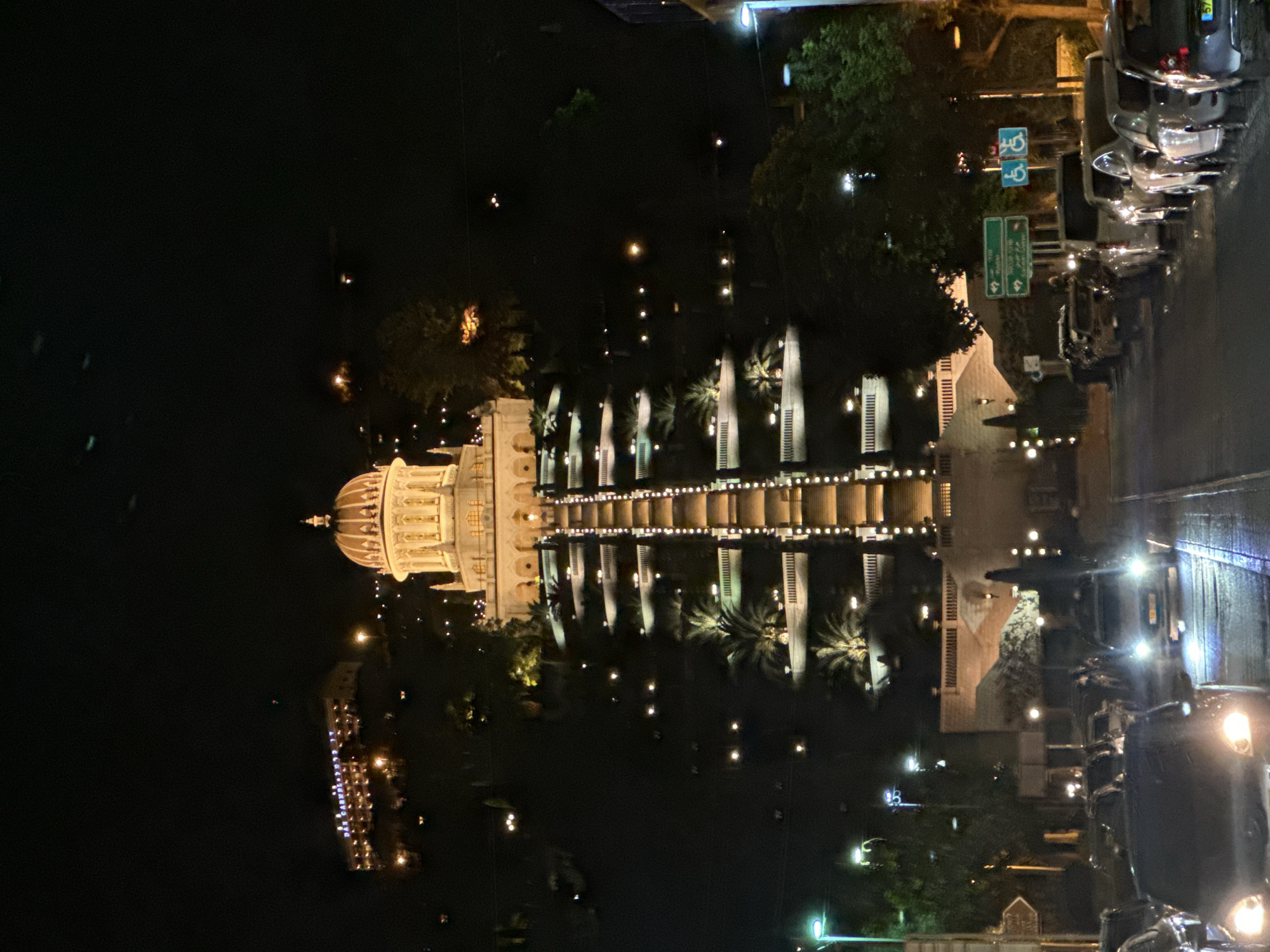 Evening scenes around Haifa — lights, landmarks, and a dinner stop