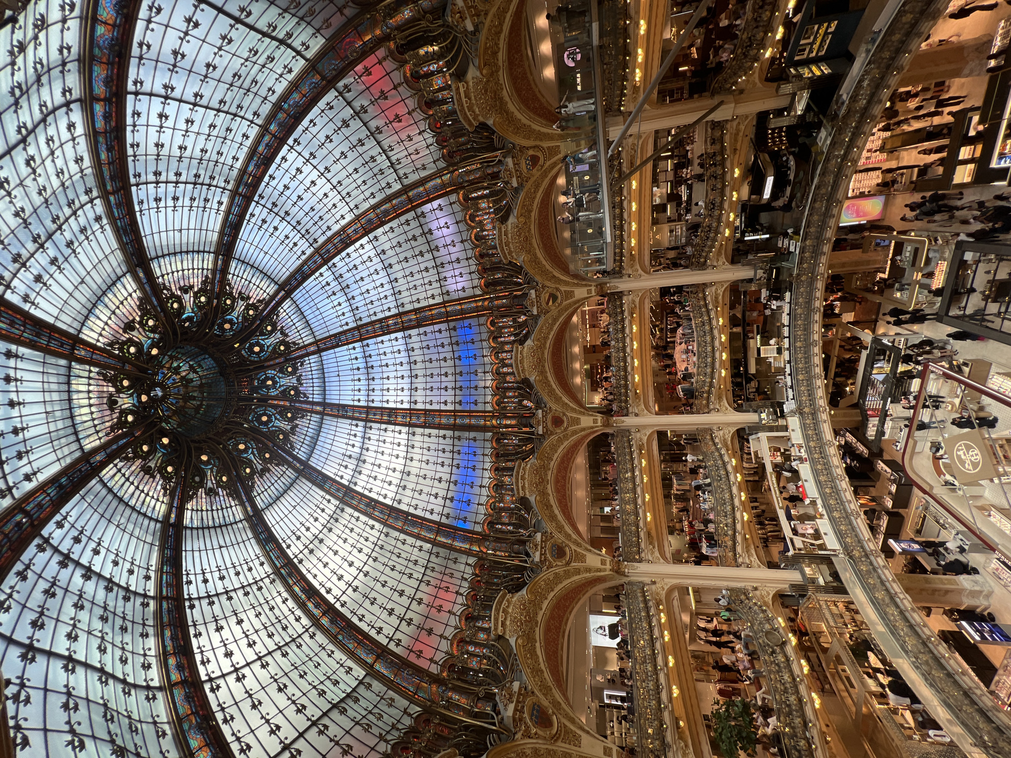 Shopper documents Galeries Lafayette's iconic Art Nouveau interior features