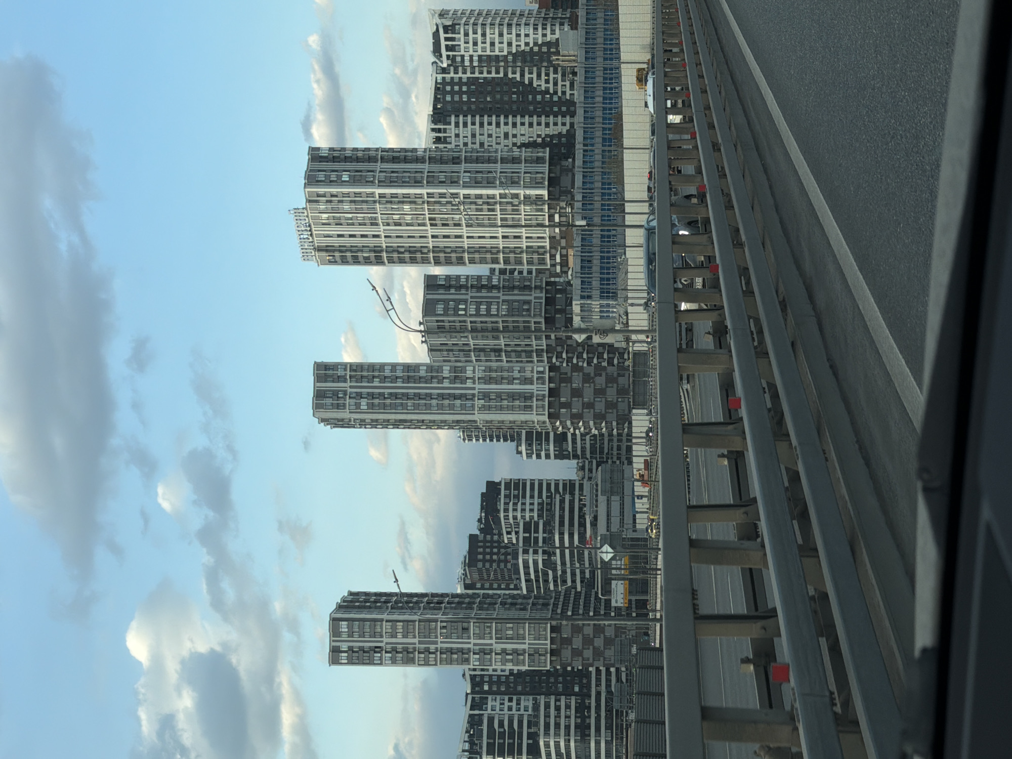 Moscow residential towers photographed under cloudy afternoon sky