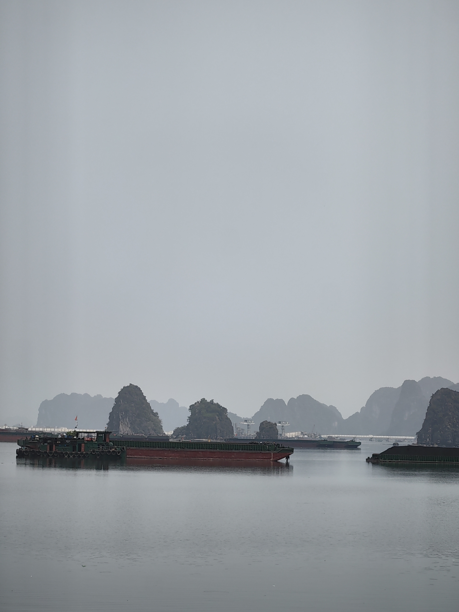 Morning view of Ha Long Bay karsts witnessed from Quang Hanh
