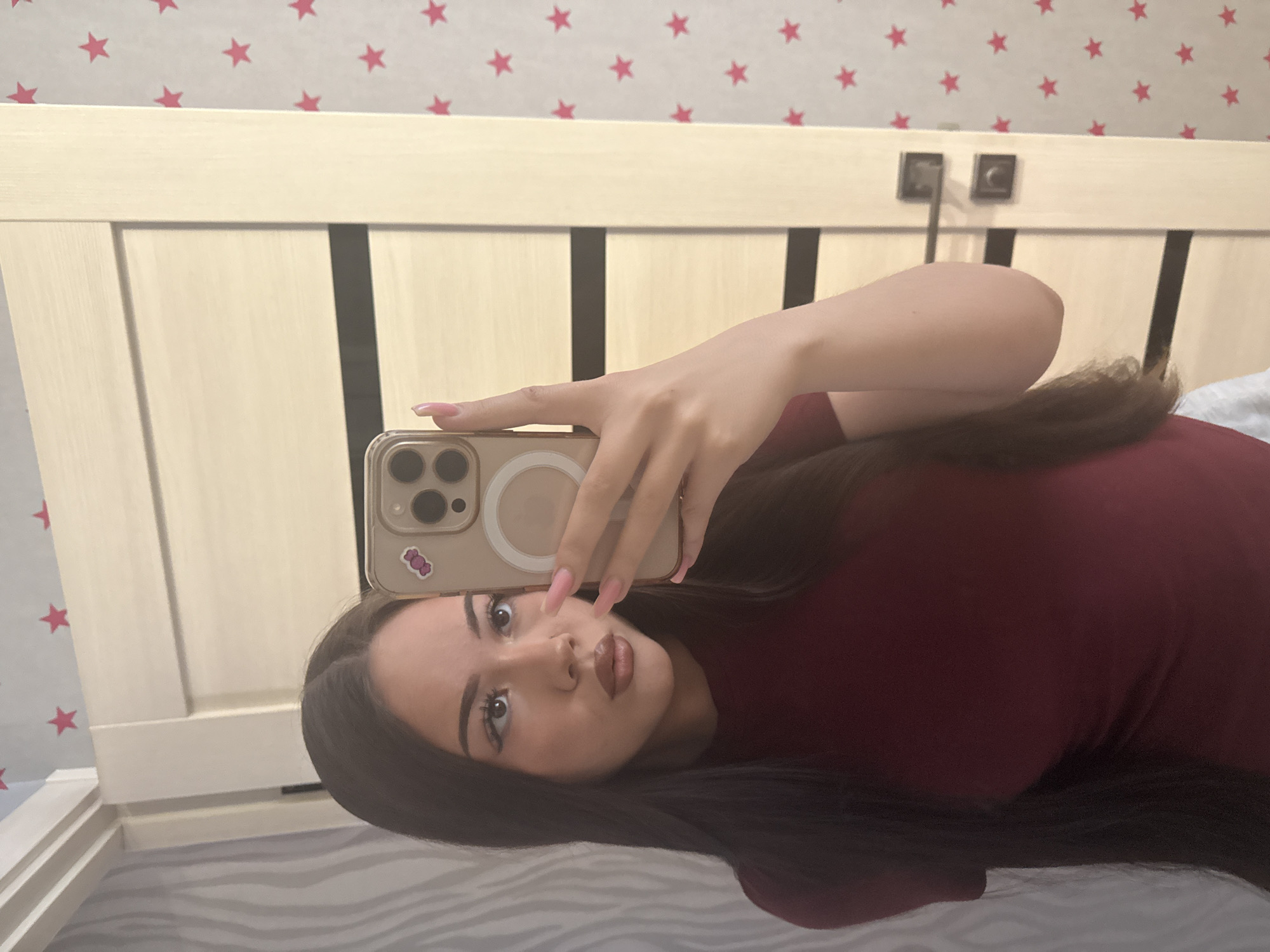 Woman takes multiple selfies in bedroom, Naberezhnye Chelny, Russia