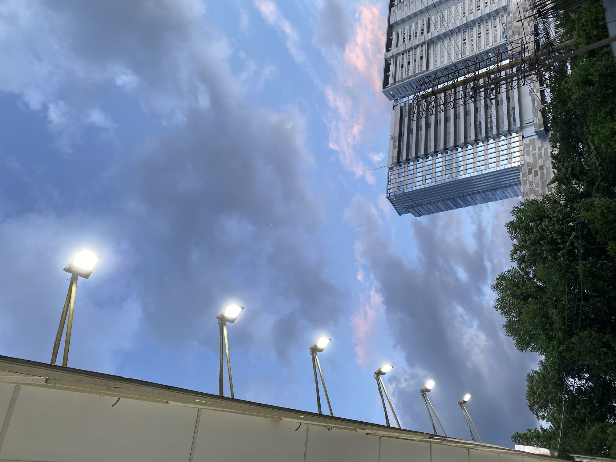 Modern skyline and street infrastructure in Gambut Barat at dusk