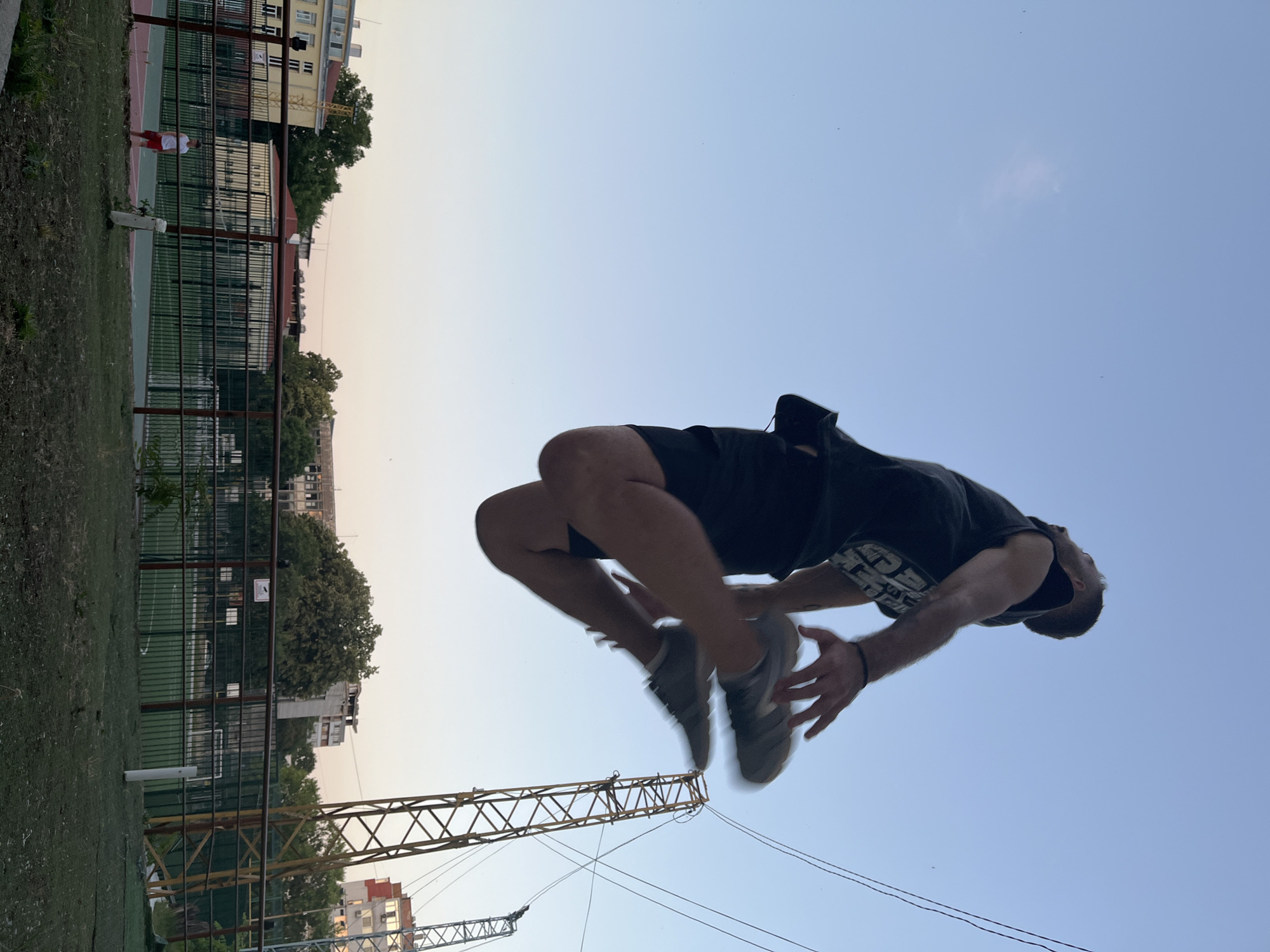Acrobatics and parkour on a Shumen outdoor court