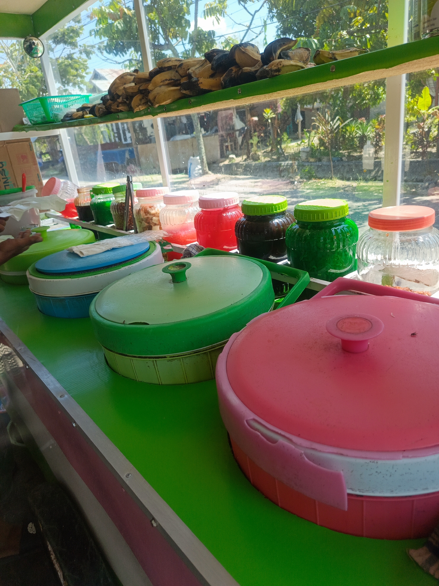 Street food stall and dessert bowl in Luwuk, Indonesia