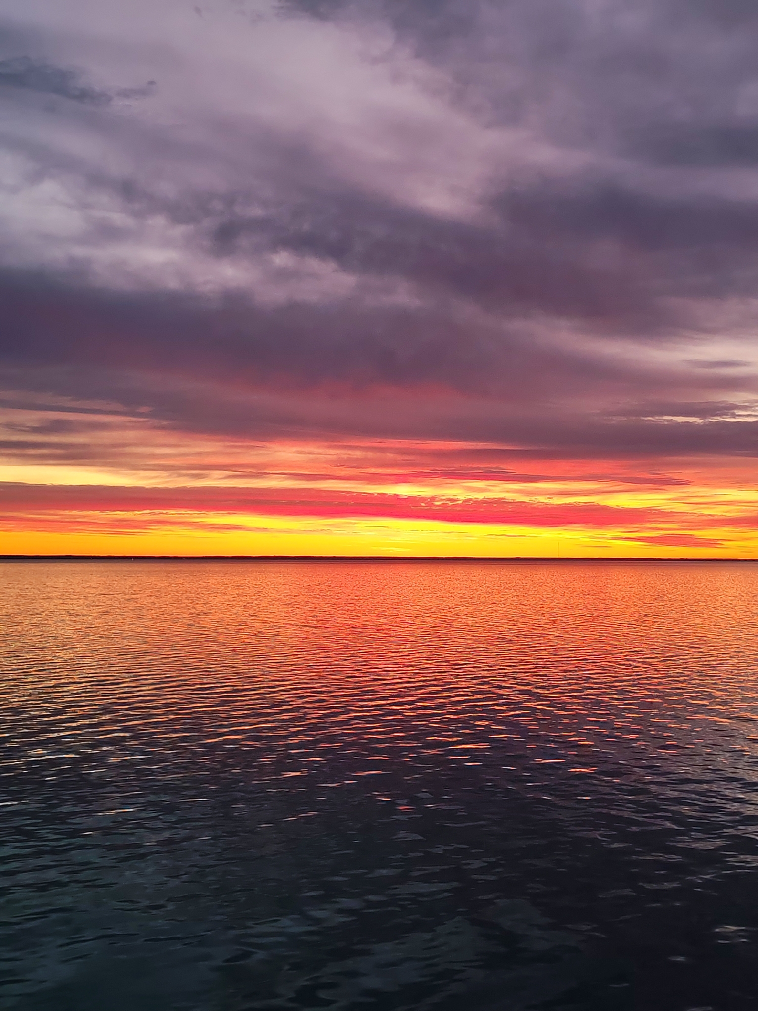 Dramatic sunset with colorful clouds observed over Russian waters