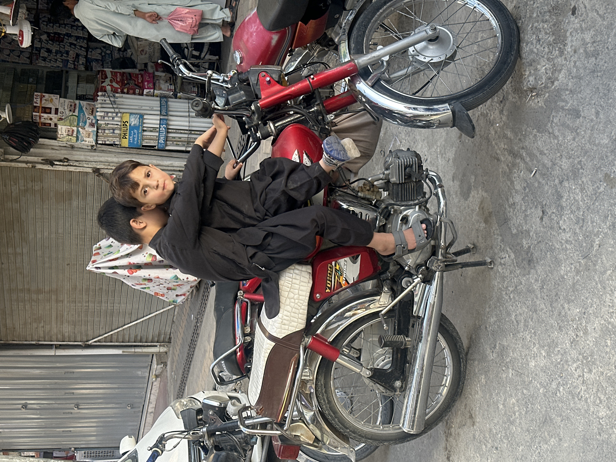 Everyday street life on motorcycles in Quetta city