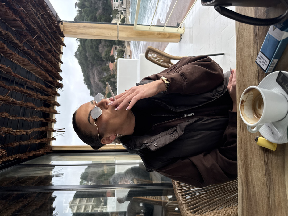 Couple dines at seaside cafes in Montenegro coastal town