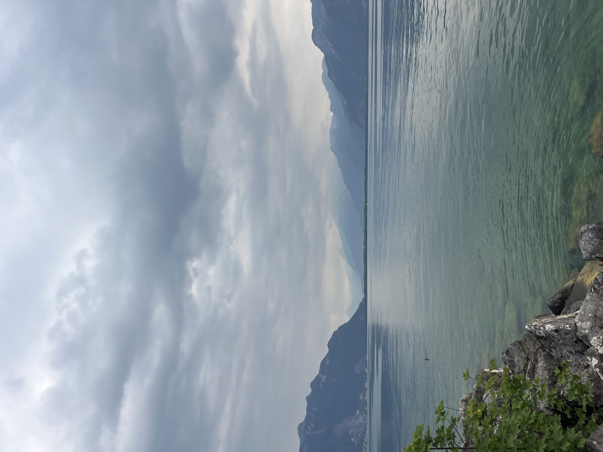 Montreux marina and Lake Geneva on a quiet, cloudy afternoon.