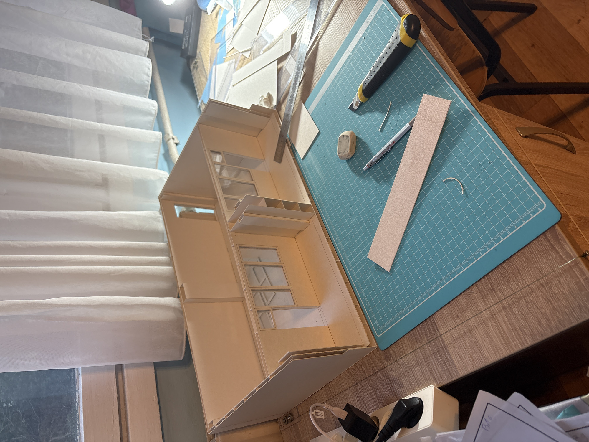 Sofia resident crafts architectural model, games at home Wednesday afternoon