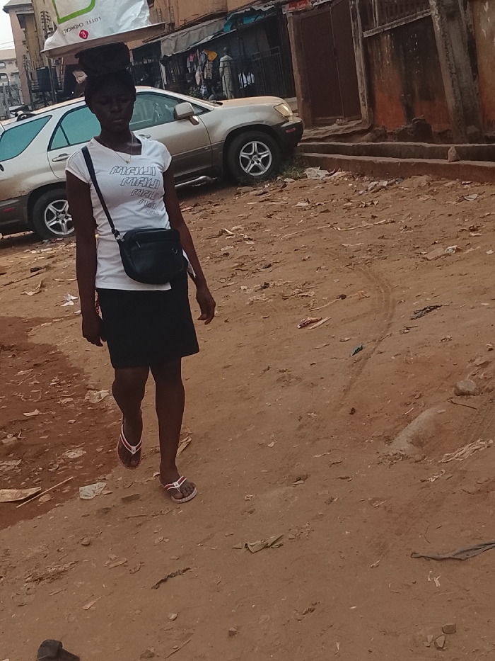 Morning street life documented across Onitsha, Nigeria neighborhoods